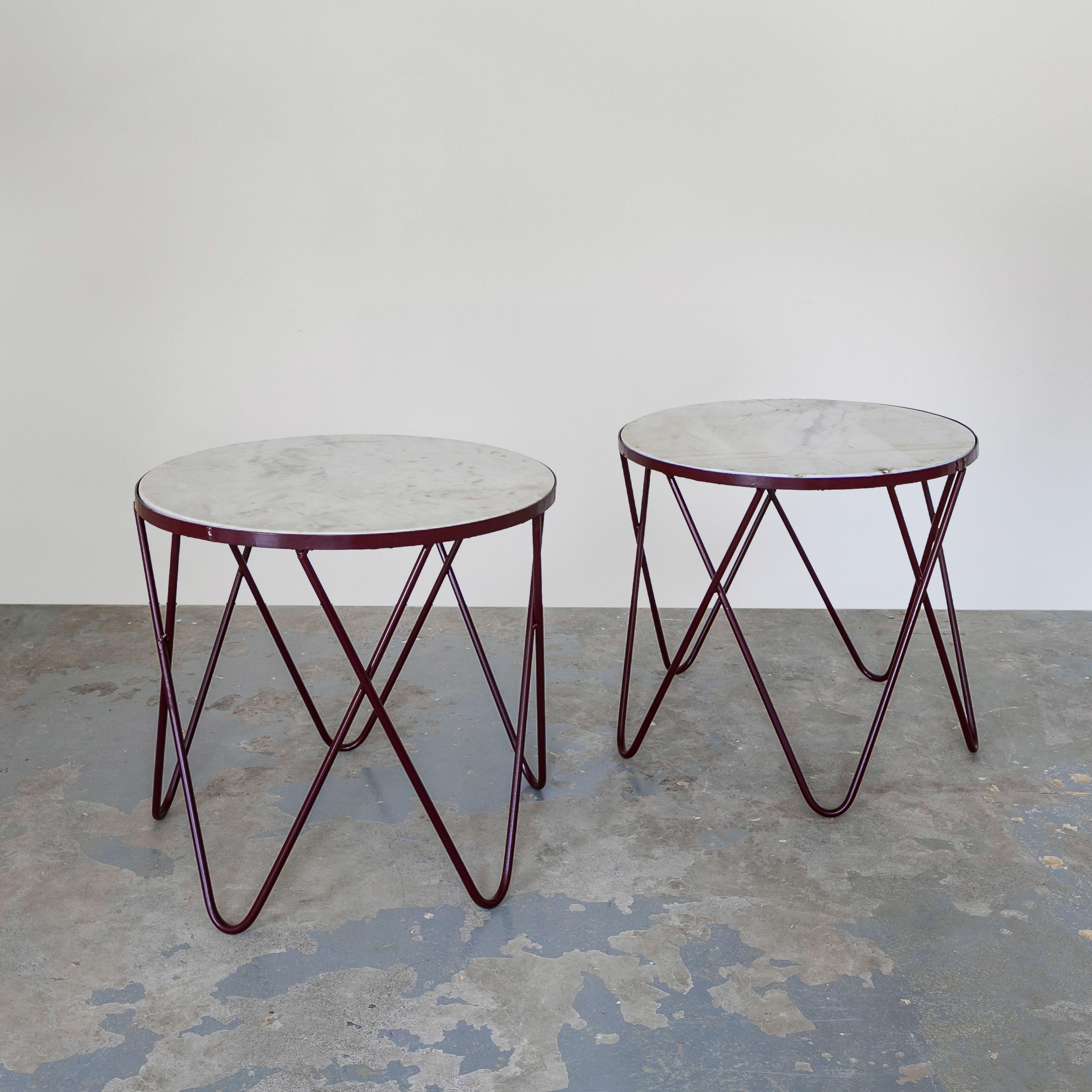 Vintage Round Marble Coffee Tables with Hairpin Legs. The plum powder coated legs act as a neutral color that will compliment your furniture. These tables can be used indoors or outdoors. 