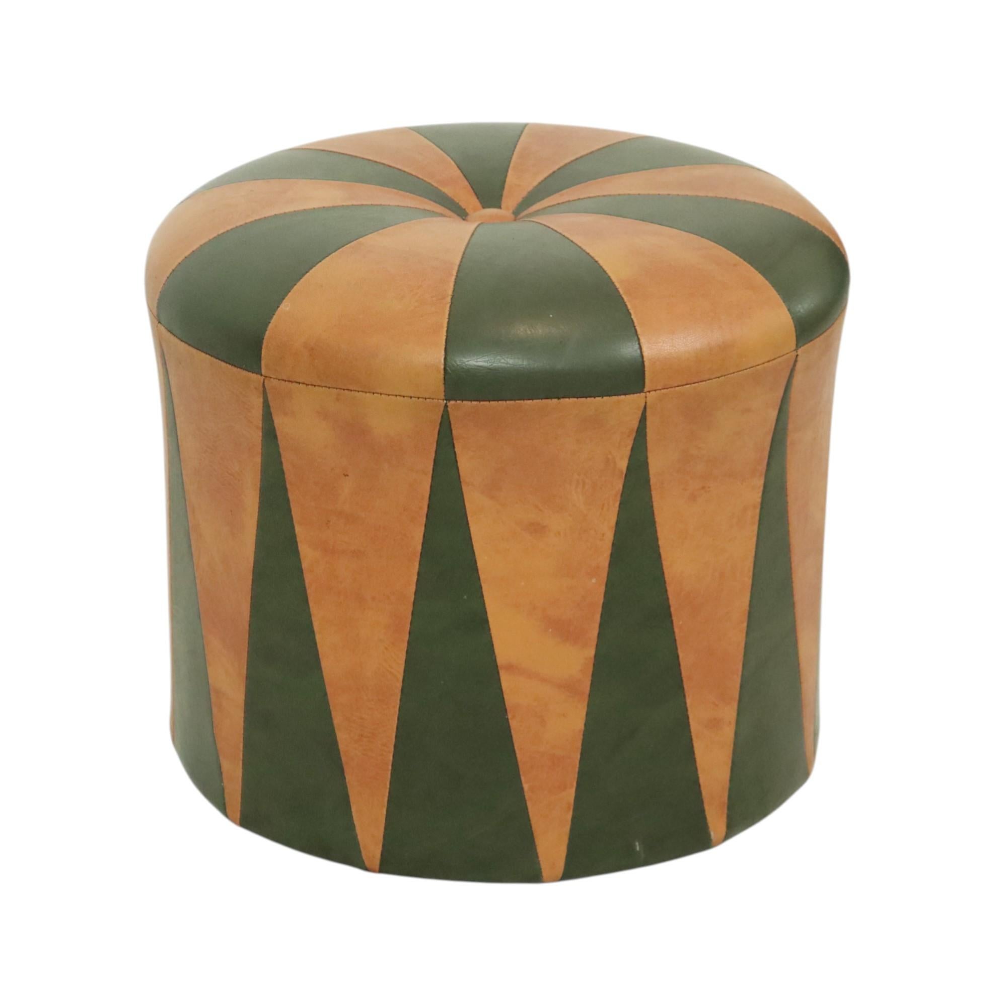 Cool vintage round ottoman in Moroccan patchwork style, made from a wooden base and upholstered in high-quality two-tone brown and green faux leather, made in Belgium circa the 1960s.

A characterful and authentic piece from the 1960s, this ottoman