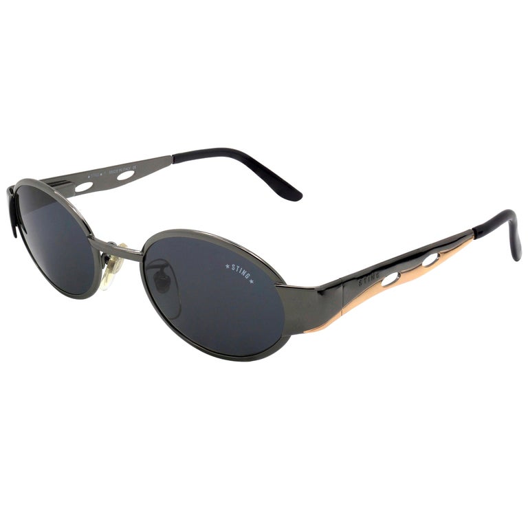 Round vintage sunglasses by Sting, Italy For Sale at 1stDibs display picture 1