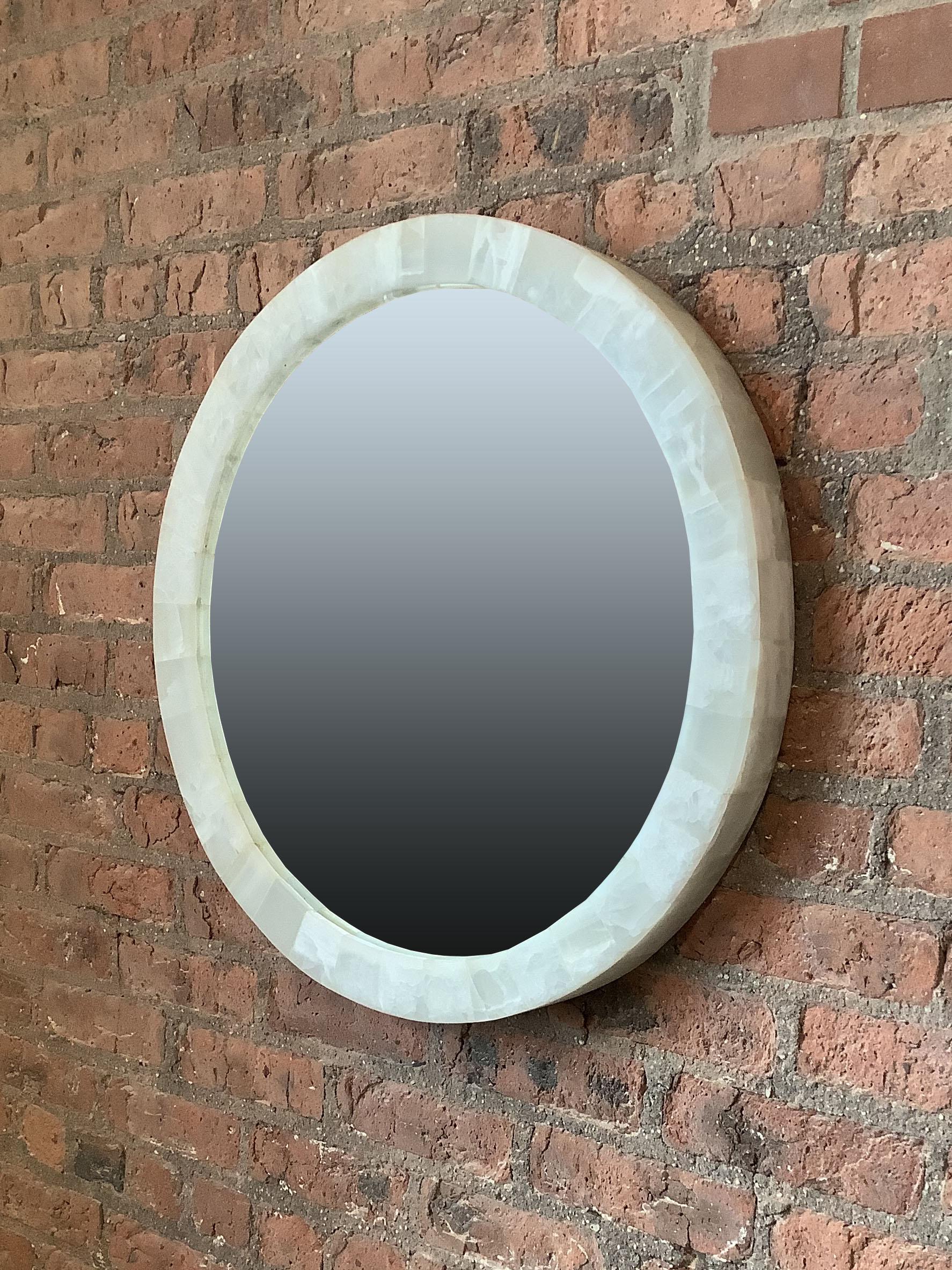 Round wall mirror in onyx. (2 available)
Onyx Mirrors

Although there are a few other places in the world where the semi-precious stone Onyx exist, we found our collection in Mexico.

A bit of information on the Semi-Precious Stone Onyx.
While