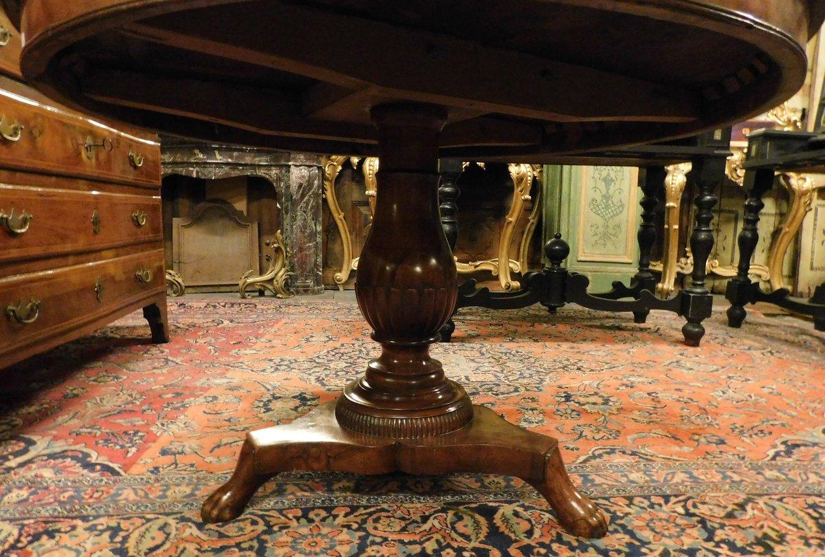 Italian Round walnut center table with inlay, carved leg, Italy For Sale