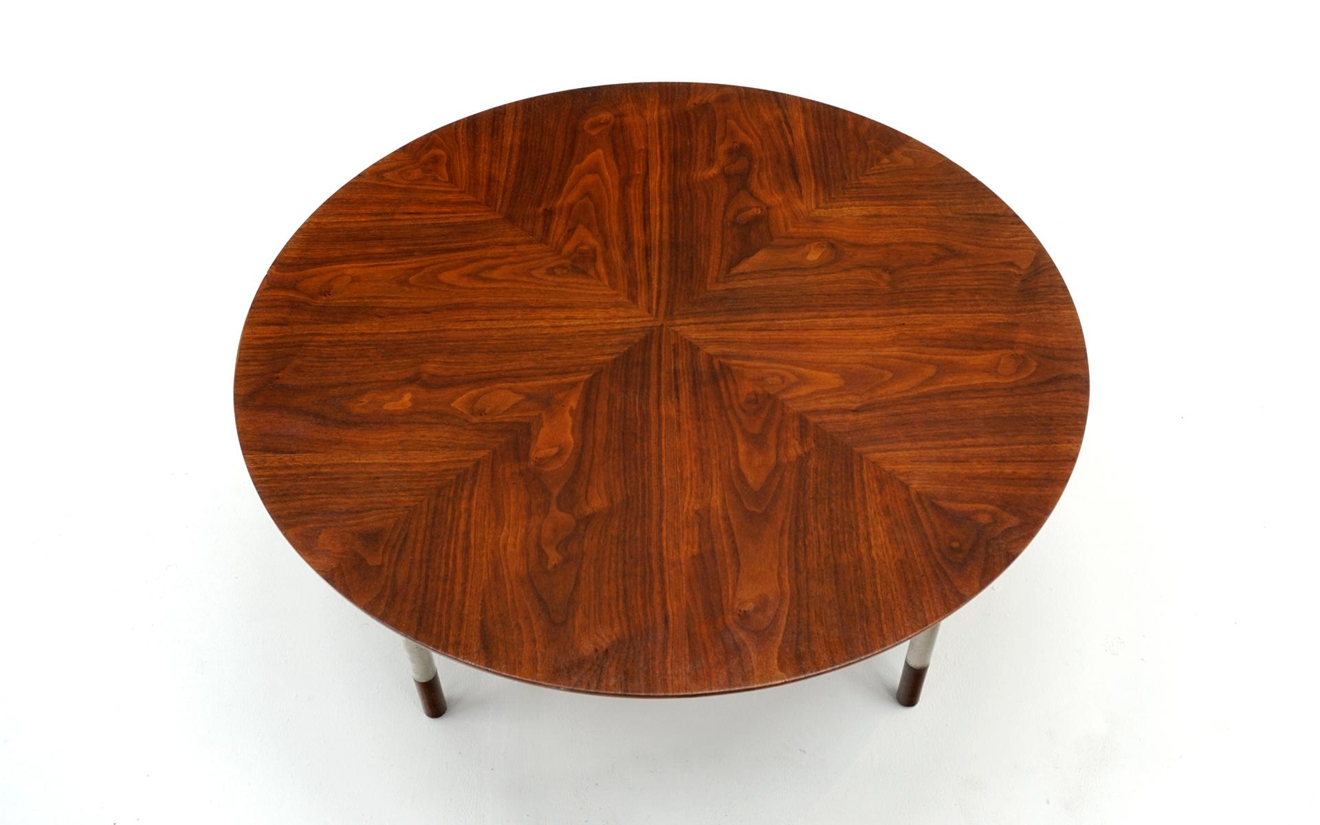 Round rosewood coffee table with chrome legs with rosewood accents. Made by Jack Cartwright in the style of Finn Juhl.
