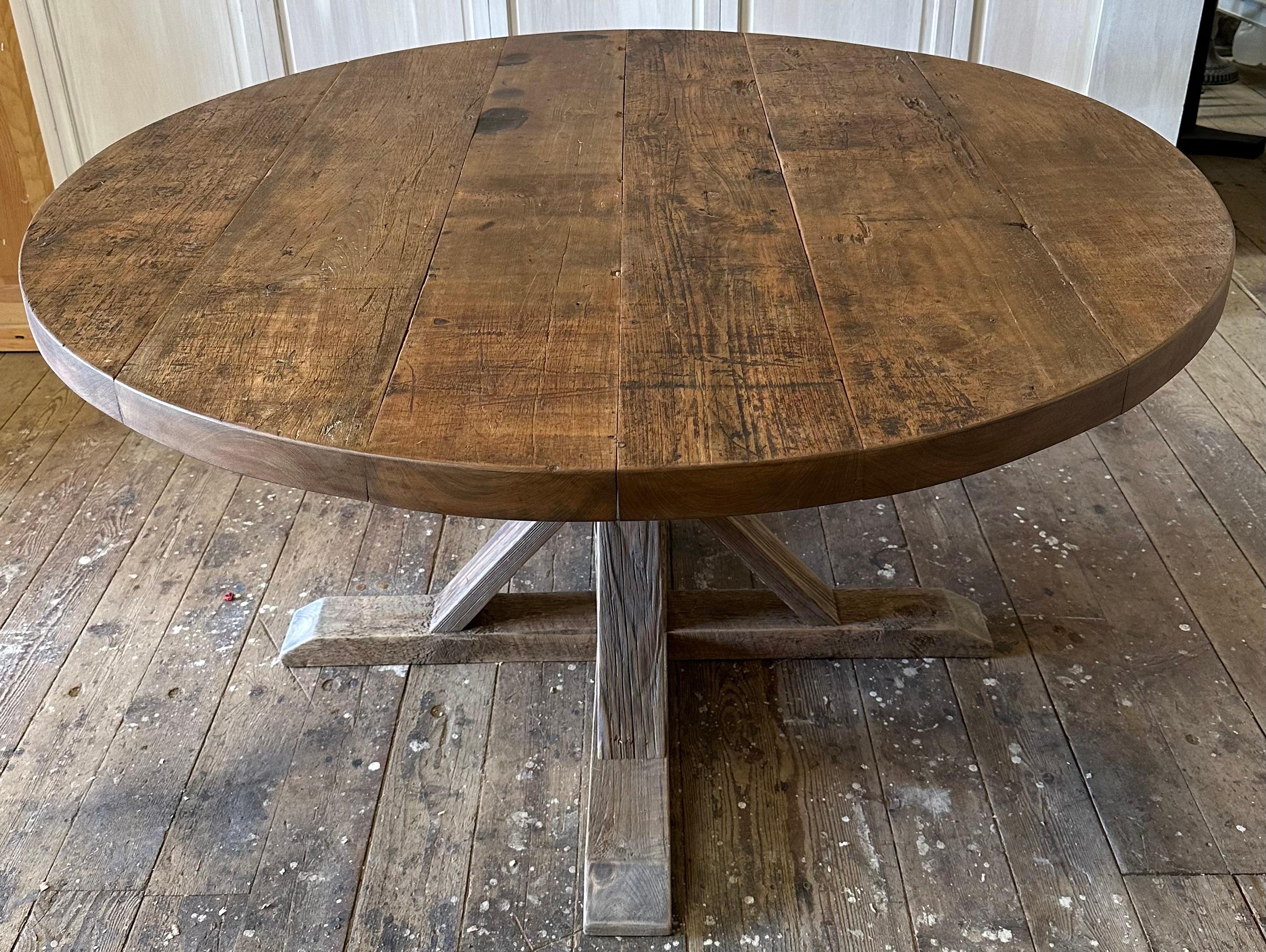 Round walnut pedestal base dining table 9