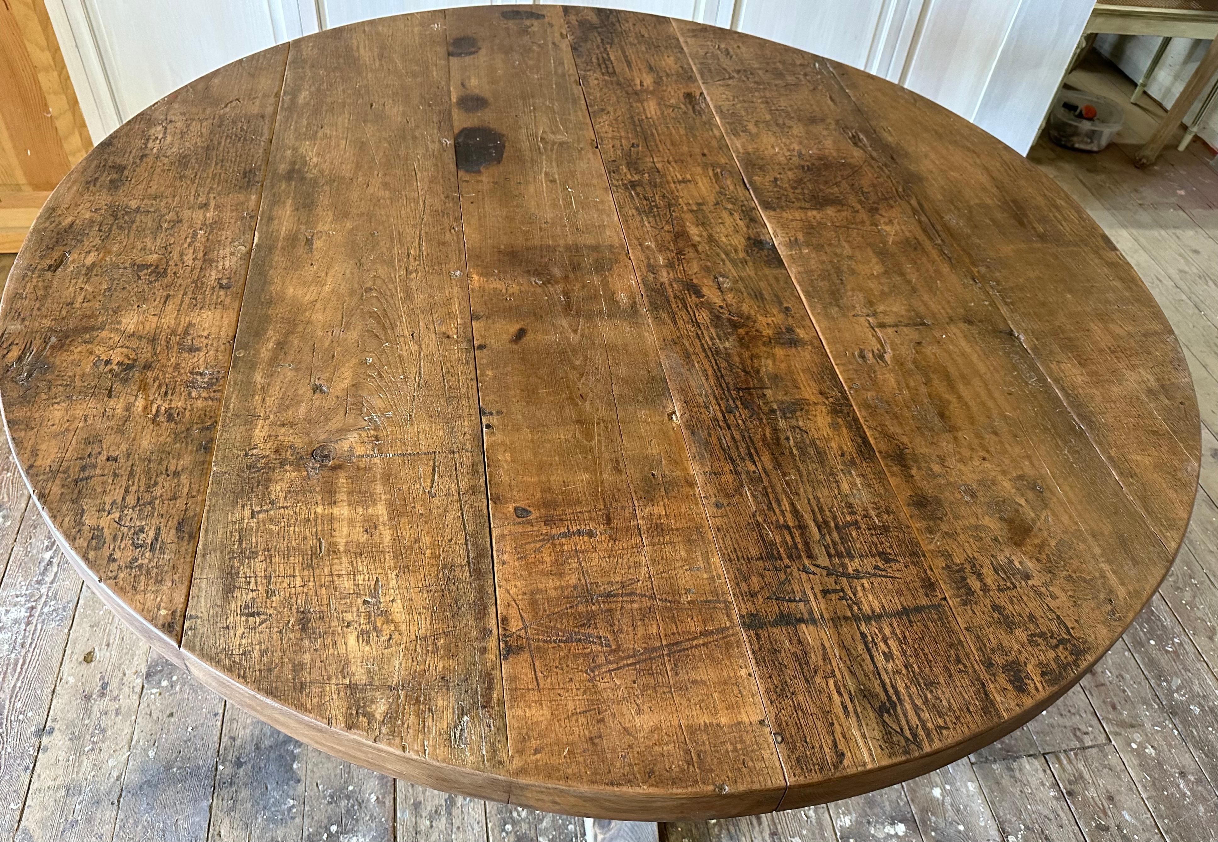 Round walnut pedestal base dining table 1