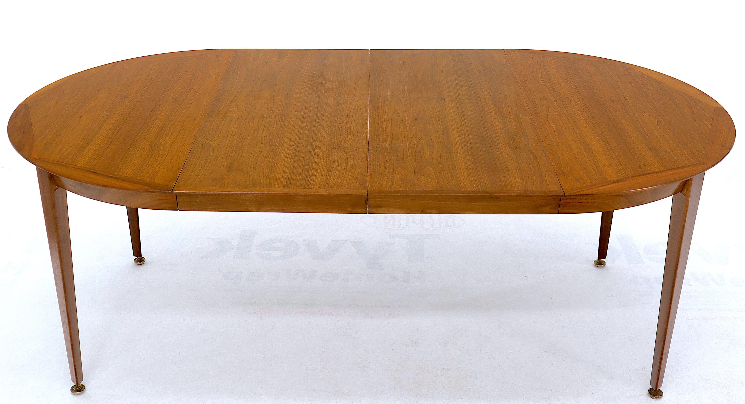 20th Century Round Walnut Tapered Legs Dining Room Table with Two Extensions Boards For Sale