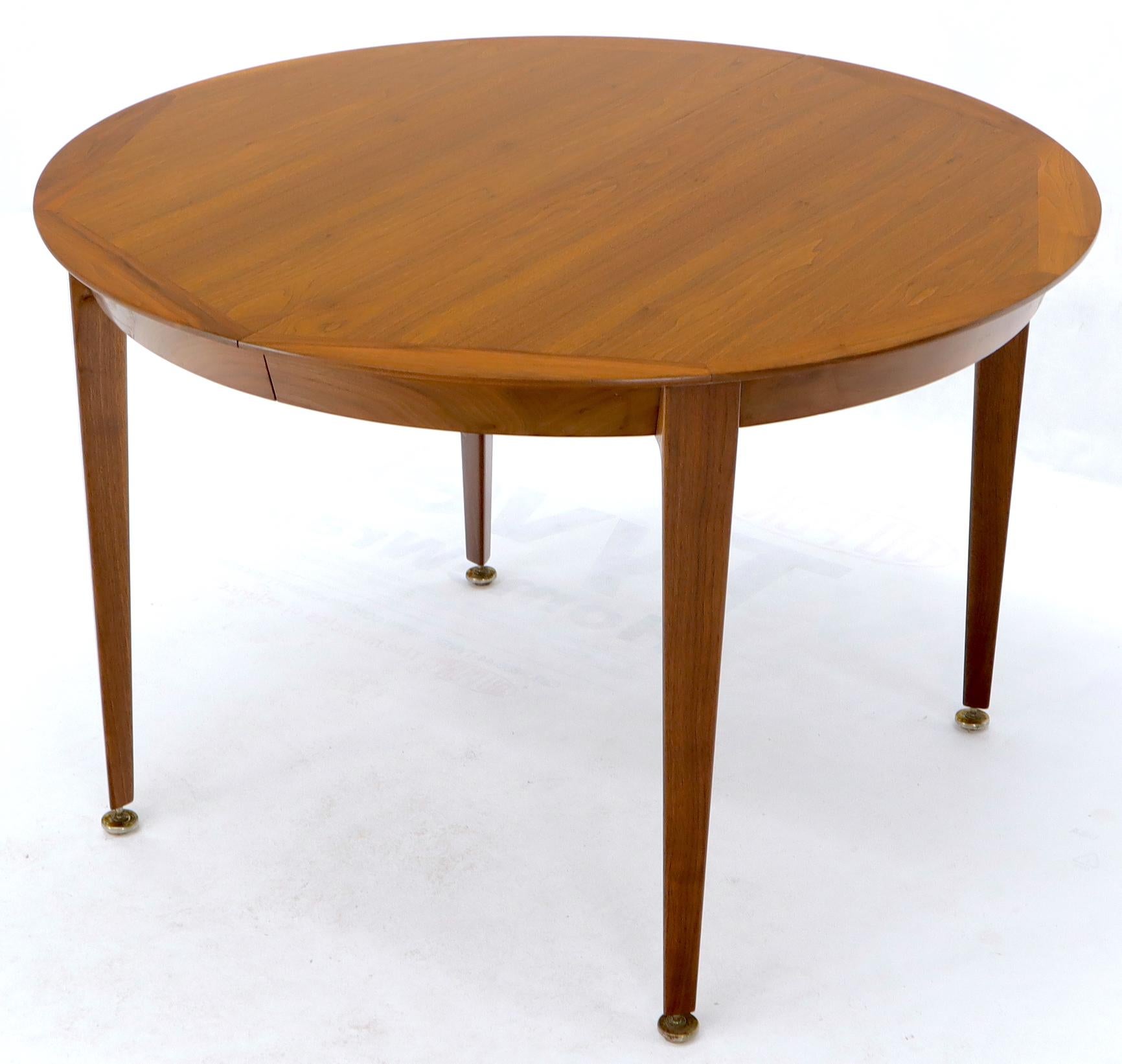 walnut round extendable dining table