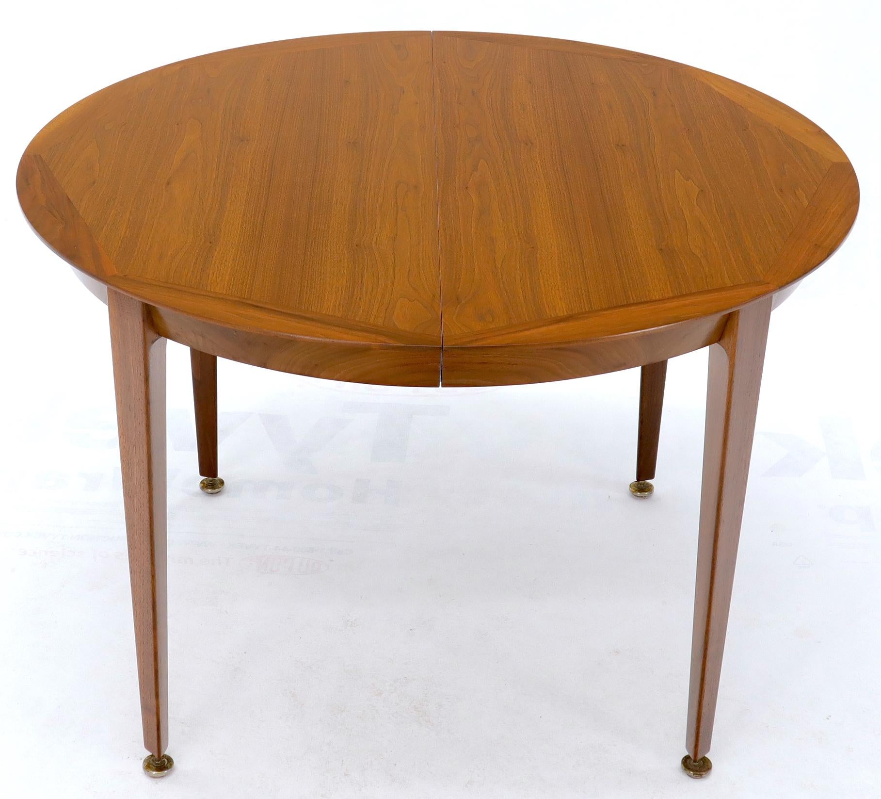 Mid-Century Modern Round Walnut Tapered Legs Dining Room Table with Two Extensions Boards For Sale