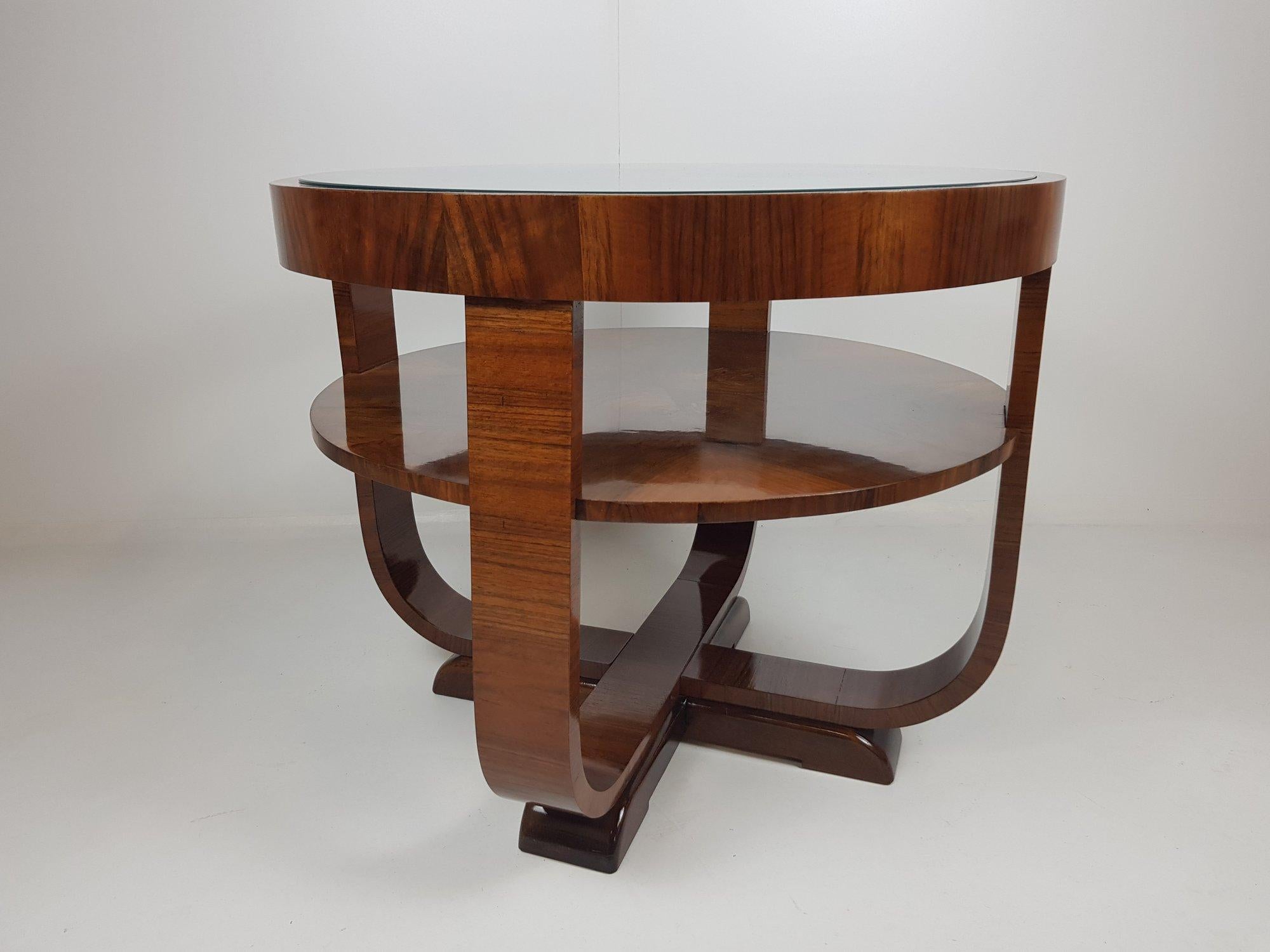 Beautiful round coffee table from walnut veneer made by Thonet (catalogued) in Czechoslovakia in the 1930's.