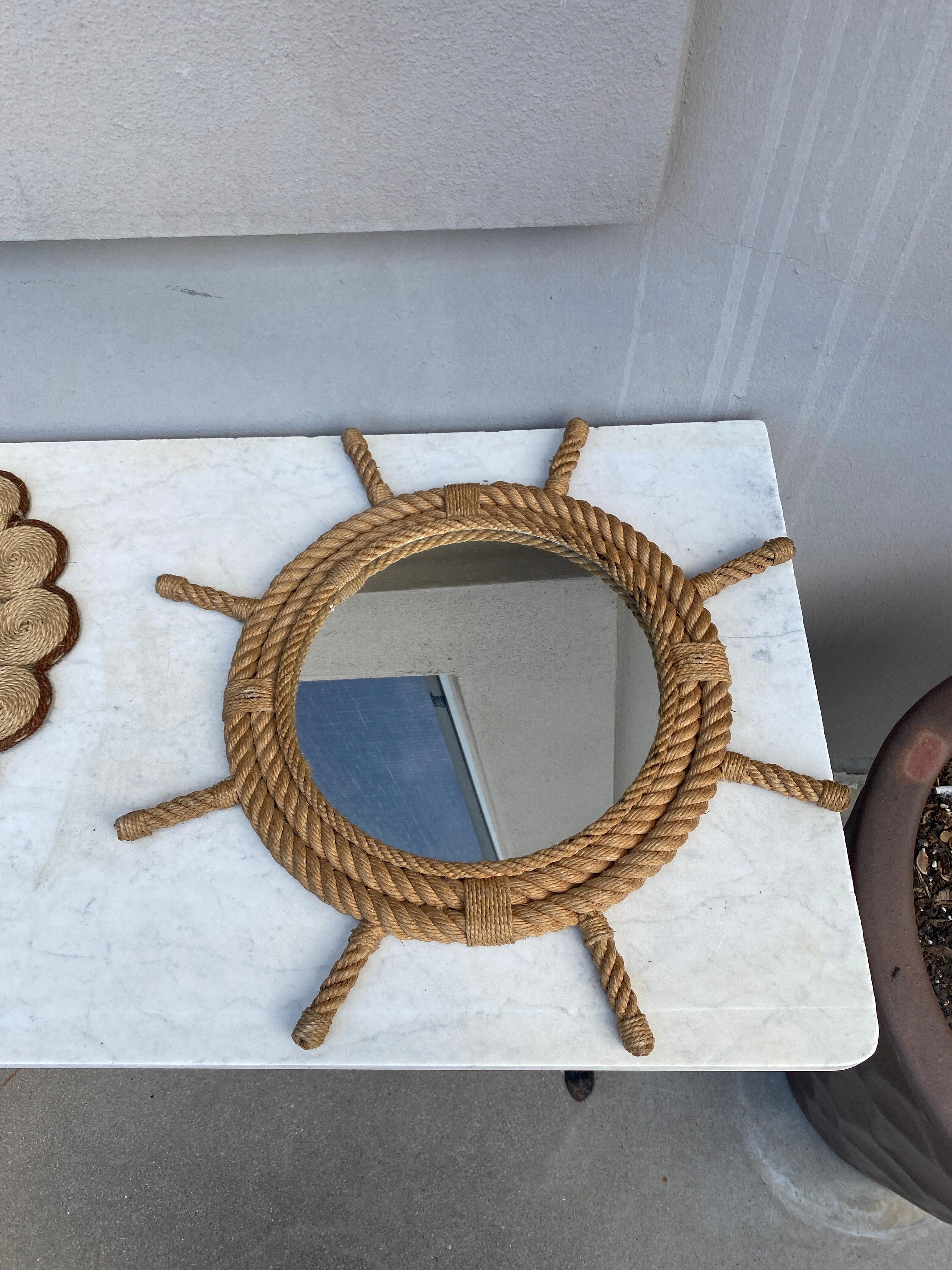 French round nautical rope mirror in a wheel shape Audoux Minet, circa 1960.
Size: 18.5 inches diameter.
