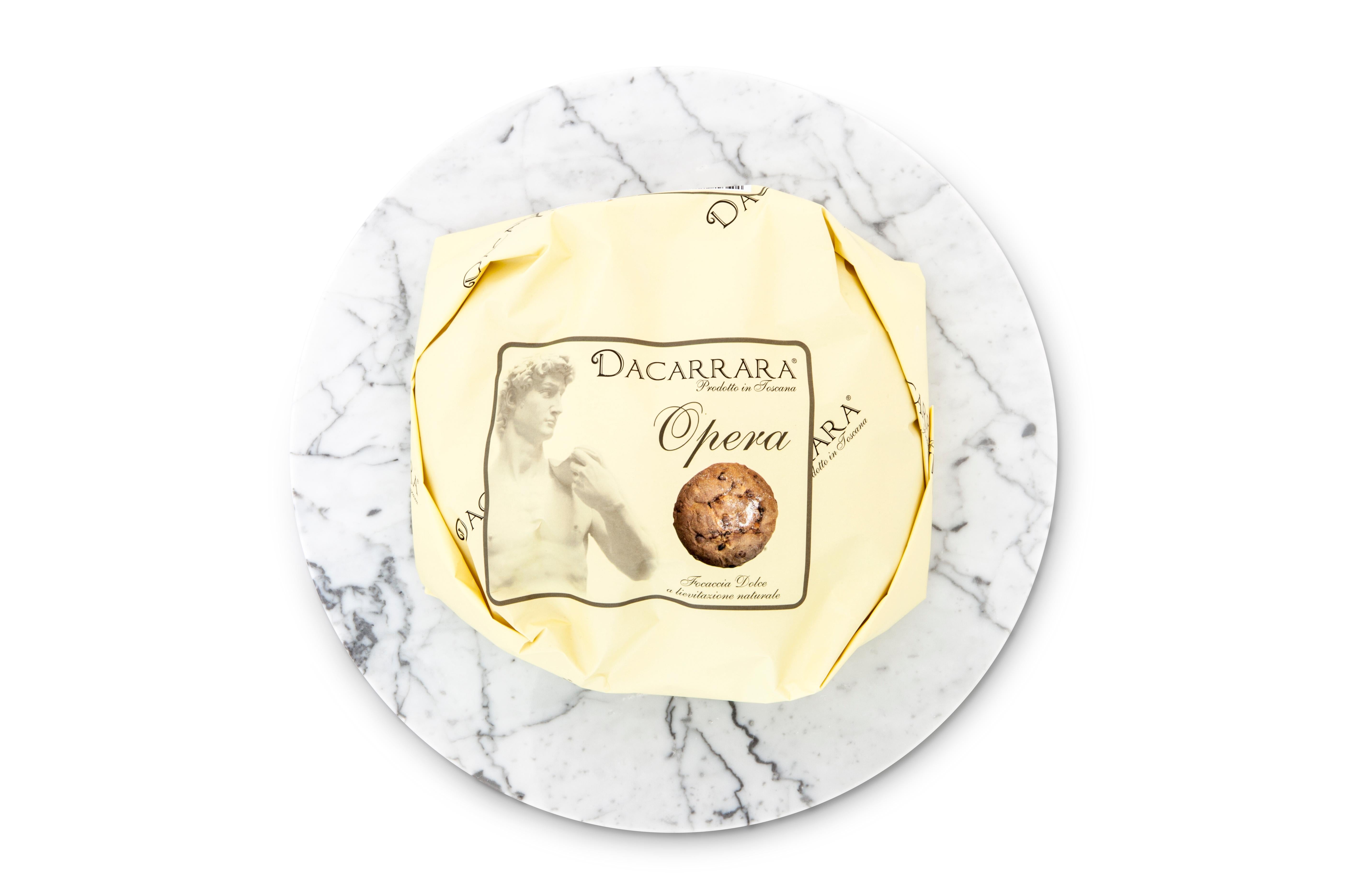 Rounded white Carrara marble cheese plate. Each piece is in a way unique (every marble block is different in veins and shades) and handmade by Italian artisans specialized over generations in processing marble. Slight variations in shape, color and