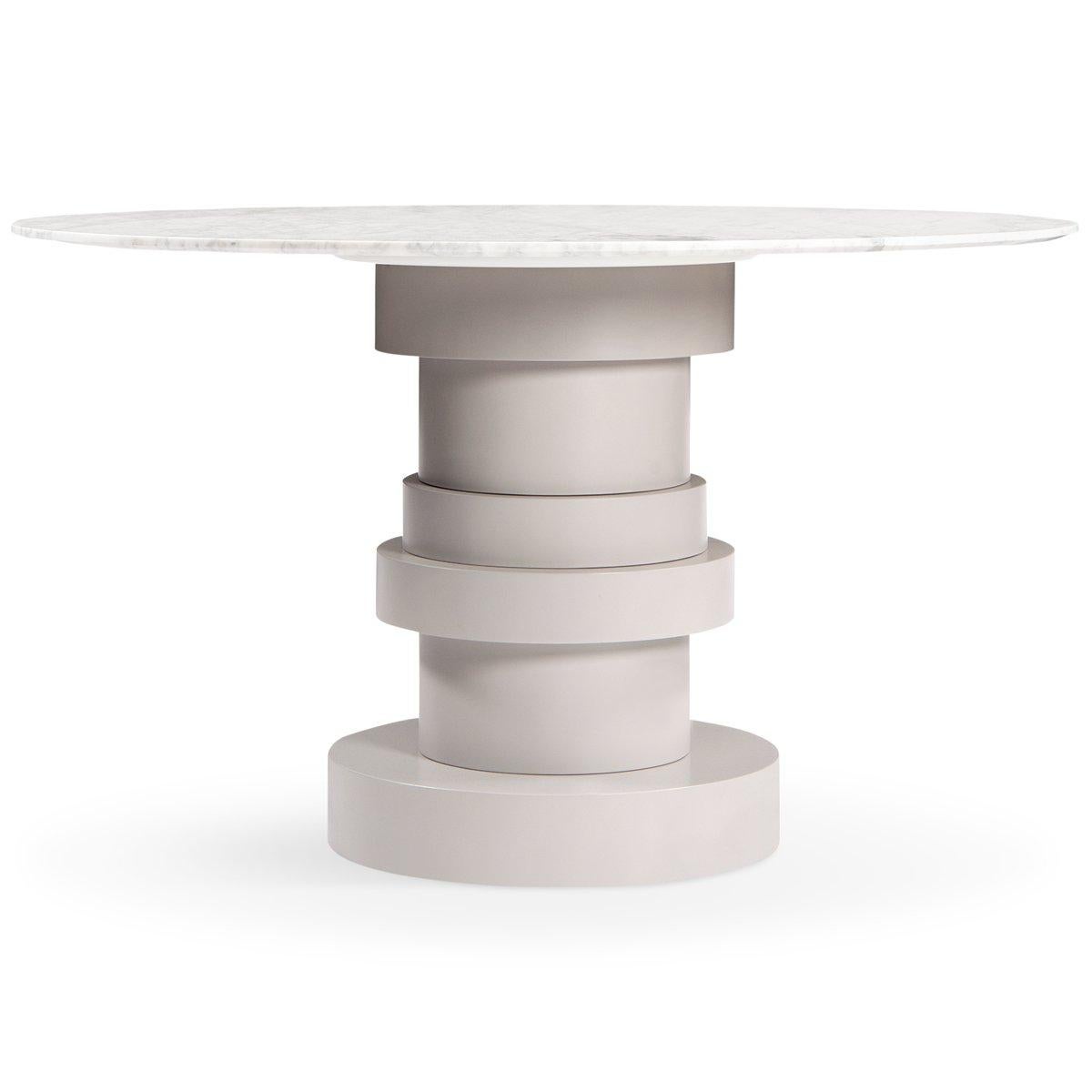 Featuring a Carrara marble top with clean lines and a stacked cylinder design base, this table is sure to impress. Smoke Ember satin lacquer layers of the base create drama while comfortable seating for up to five makes this table ready for