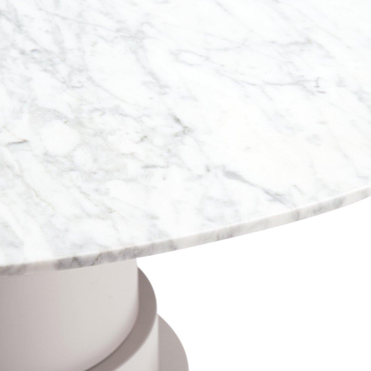 white pedestal round dining table