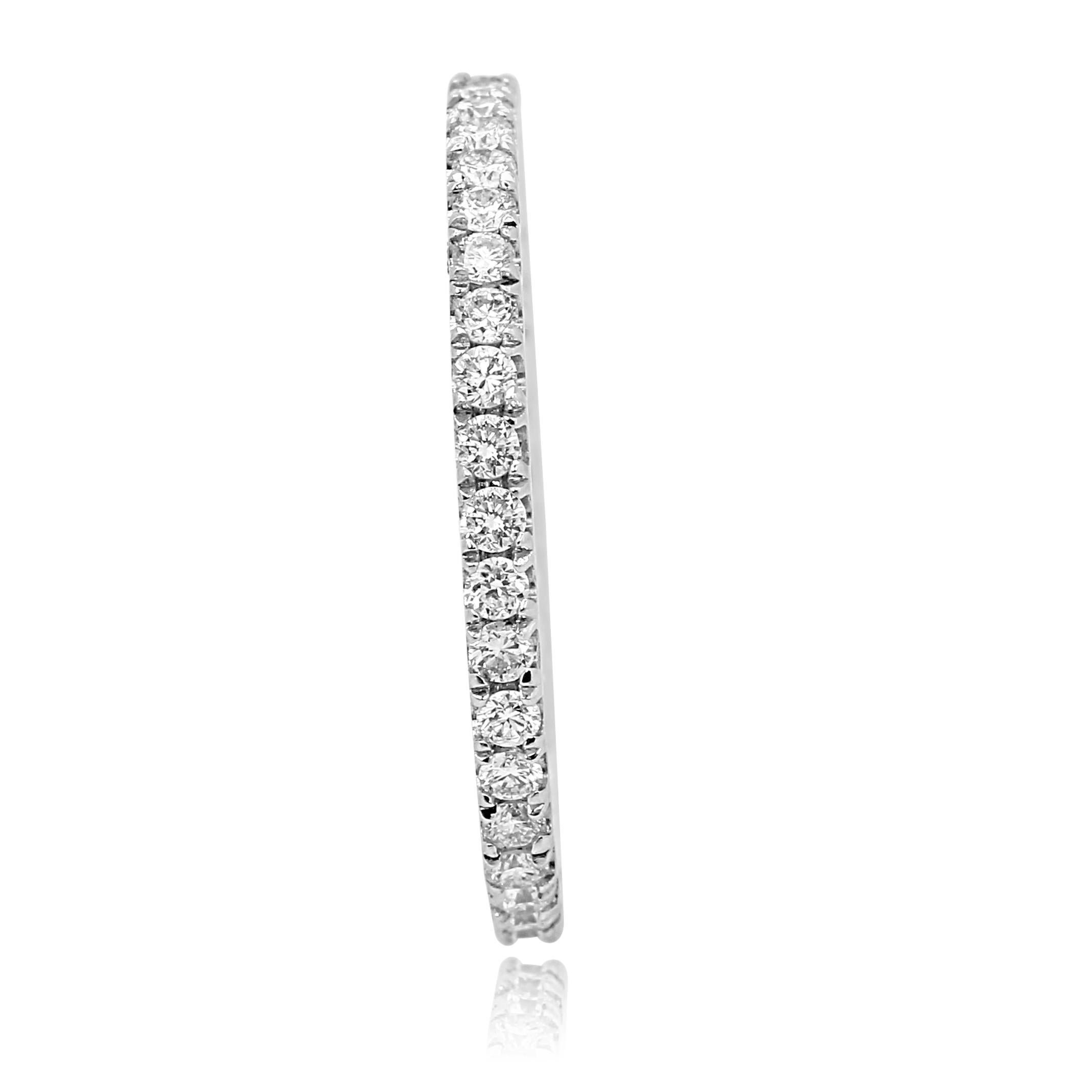 Colorless Round Brilliant VS-SI quality Diamonds set 0.56 Carat in 14K White Gold Bridal Eternity Band Ring.

Total Diamond Weight 0.56 Carat