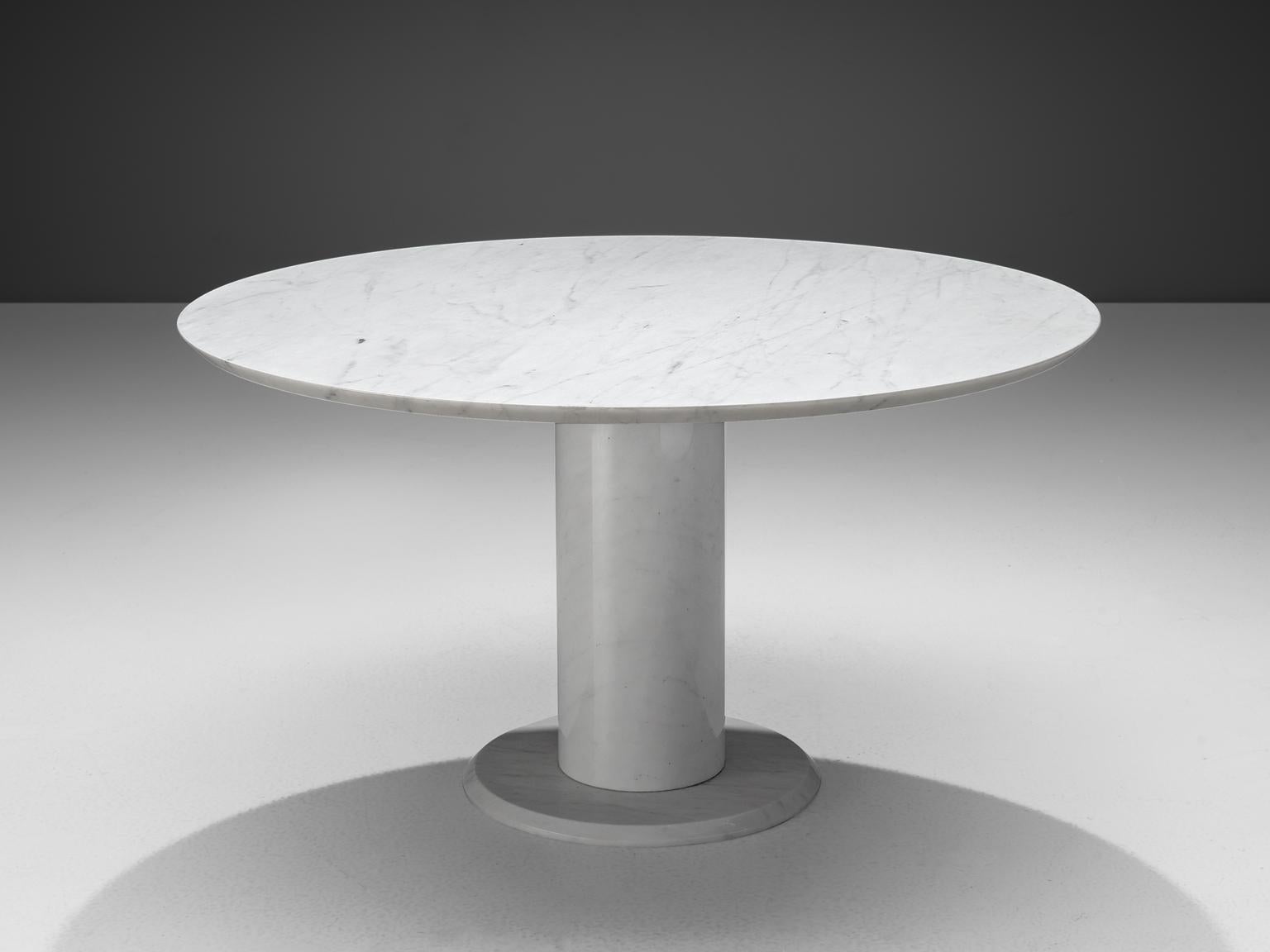 Round dining table, white Carrara marble, Italy, 1960s

Hailing from Italy during the vibrant 1960s, this round dining table crafted from exquisite white Carrara marble epitomizes the artistry and innovation of postmodern design. Its sleek
