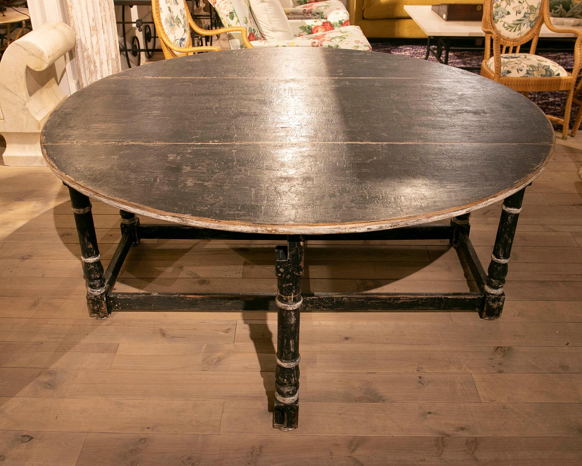 Spanish Round Wing Table with Drawers in Old Black Polychromed Side Panels For Sale
