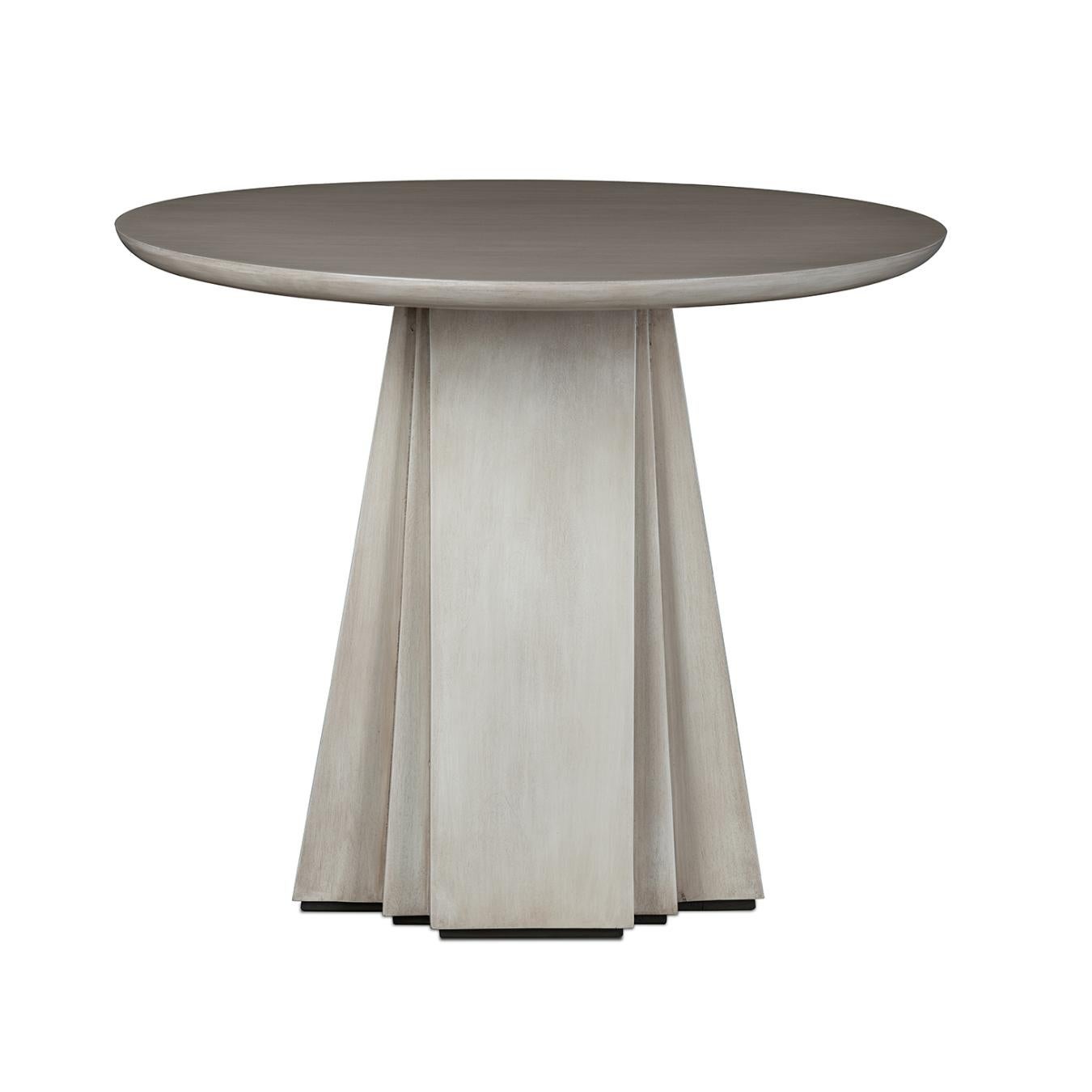 The Rochelle lamp table has a geometric base which leads to an symmetrical beech wood table top. The design is simple but stands out due to the detailing on molding on the table top and sleekness of the base.
 