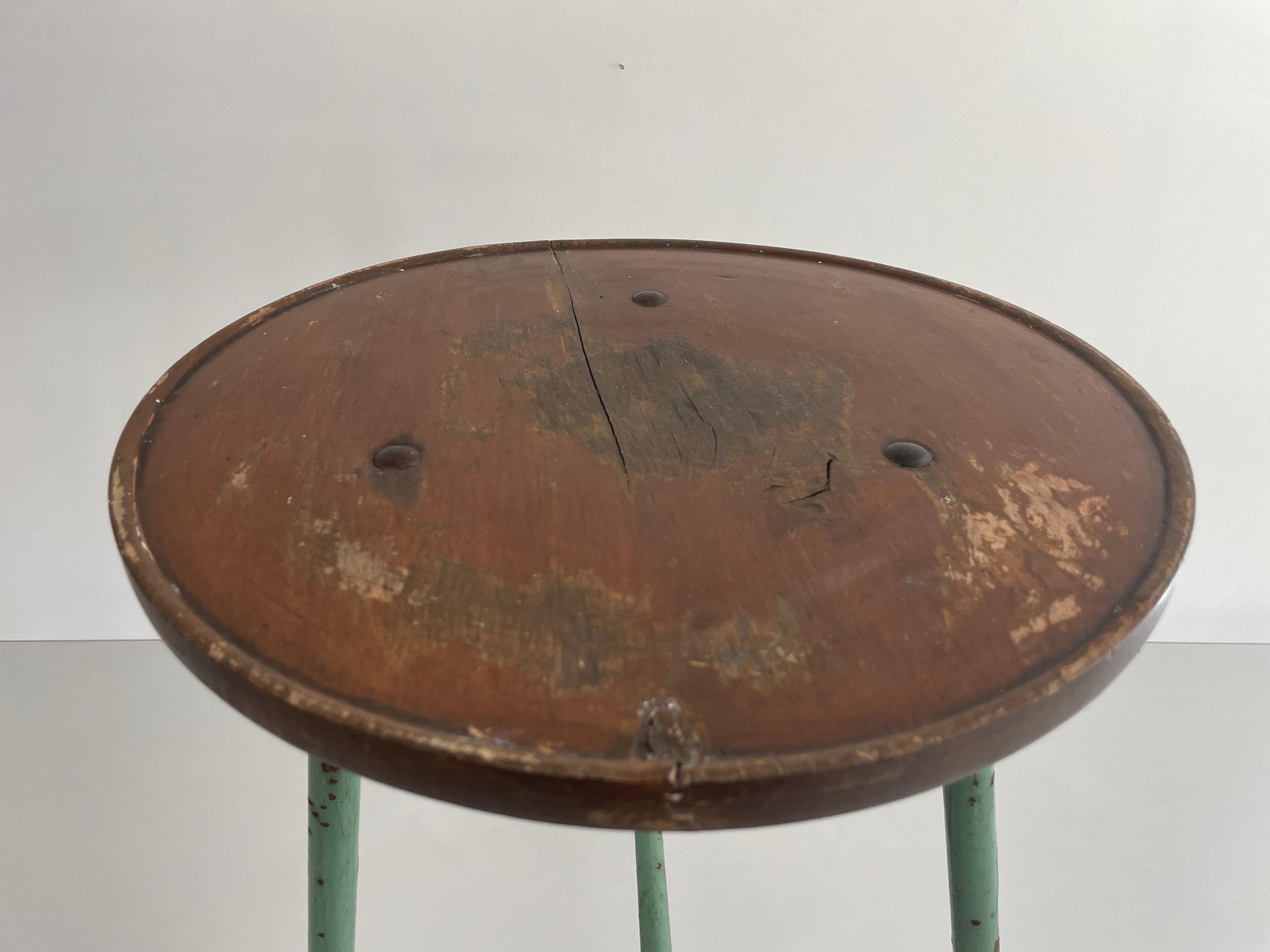 Wrought Iron Round Wood Top Industrial Stool with Green Iron Tripod Legs, 1940s, Germany For Sale