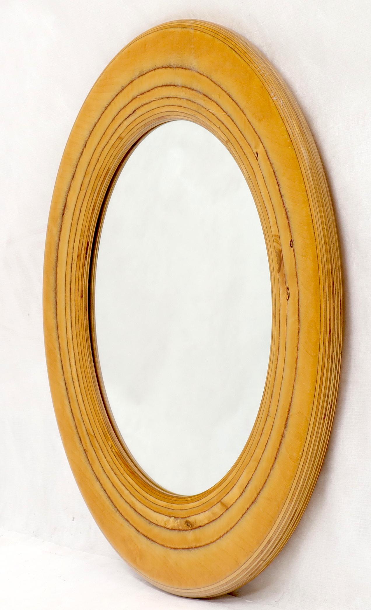 round wooden mirror