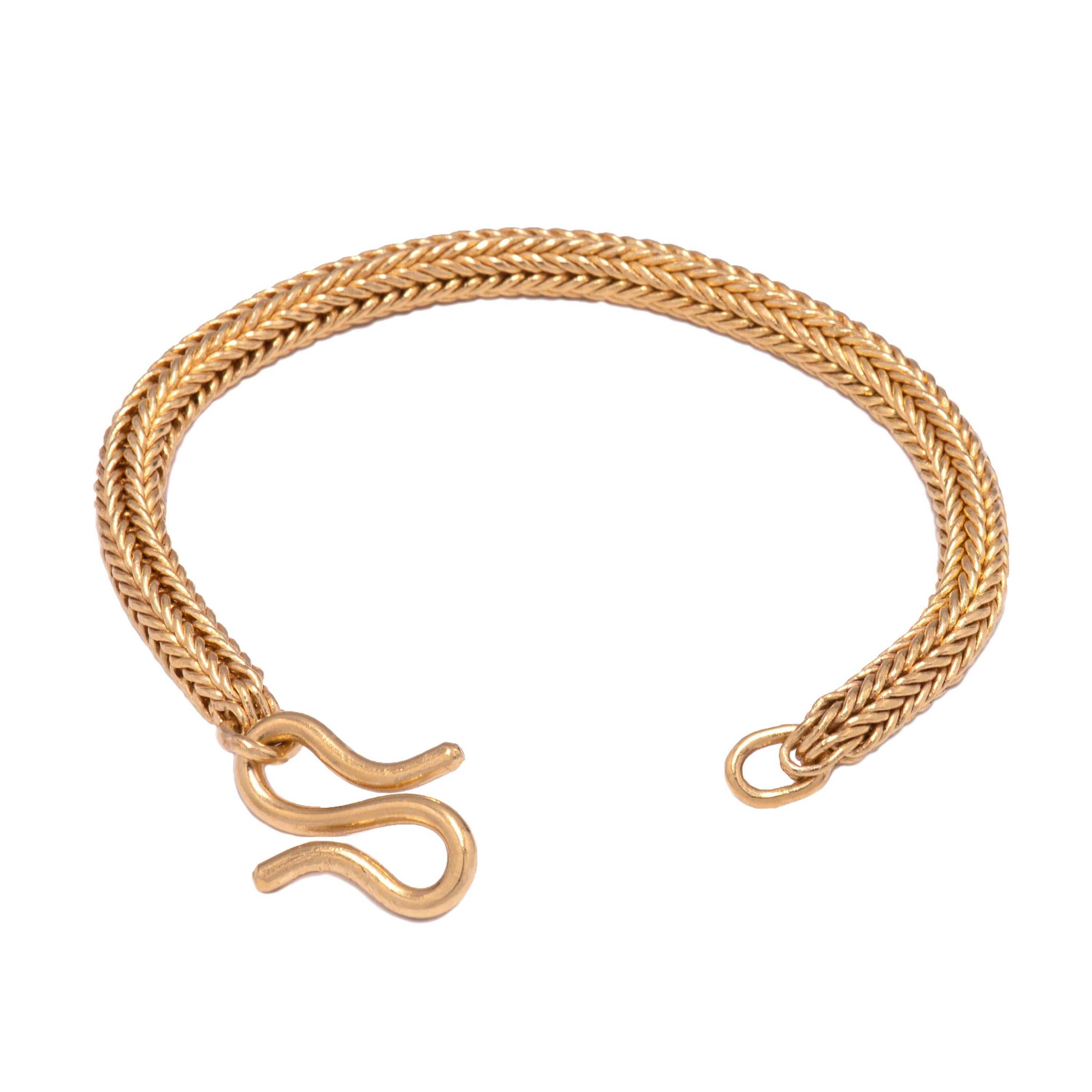 Handwoven by Keith Berge, this 22k gold bracelet is round woven at approximately 1/4