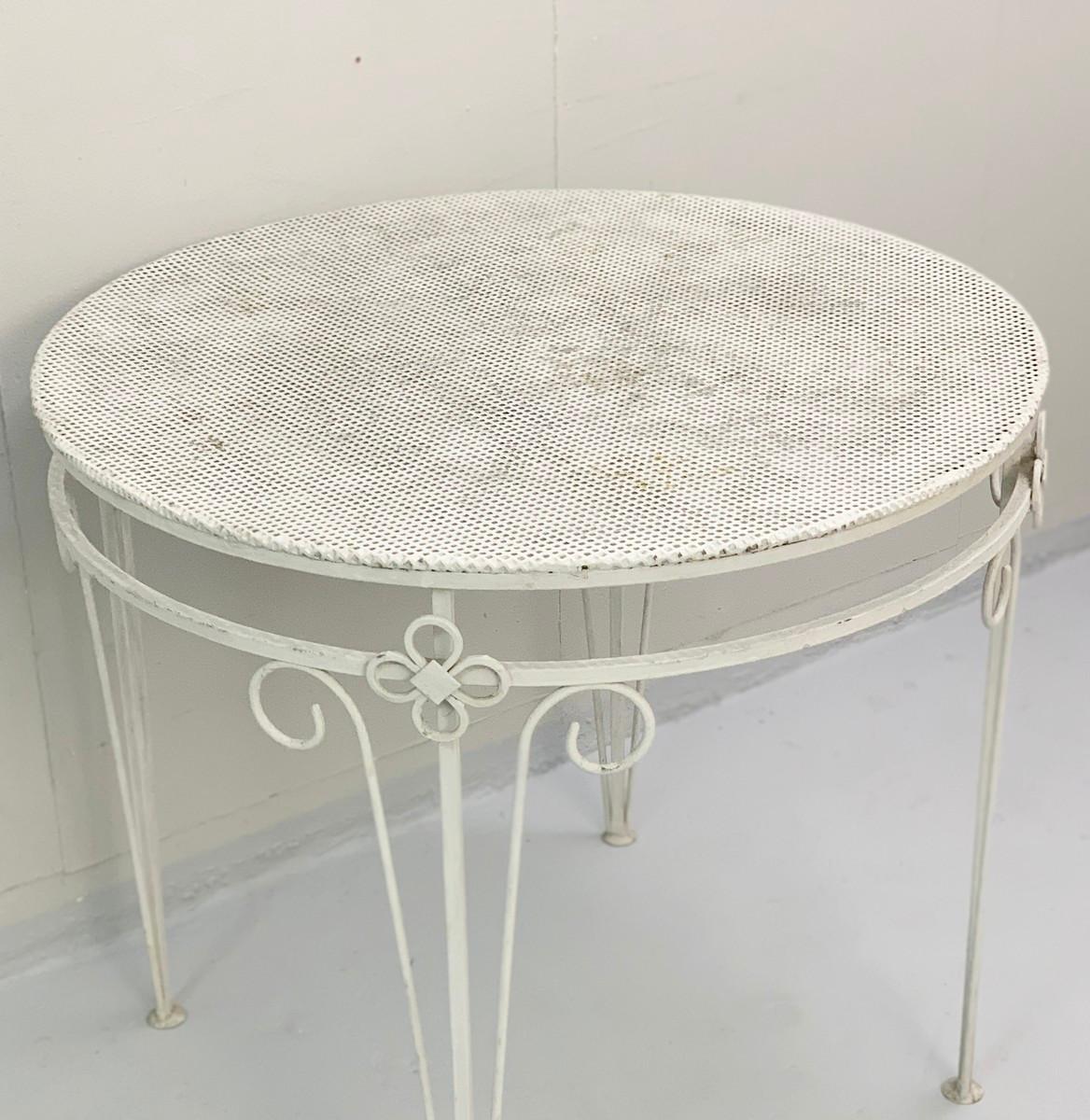 Round wrought iron table.