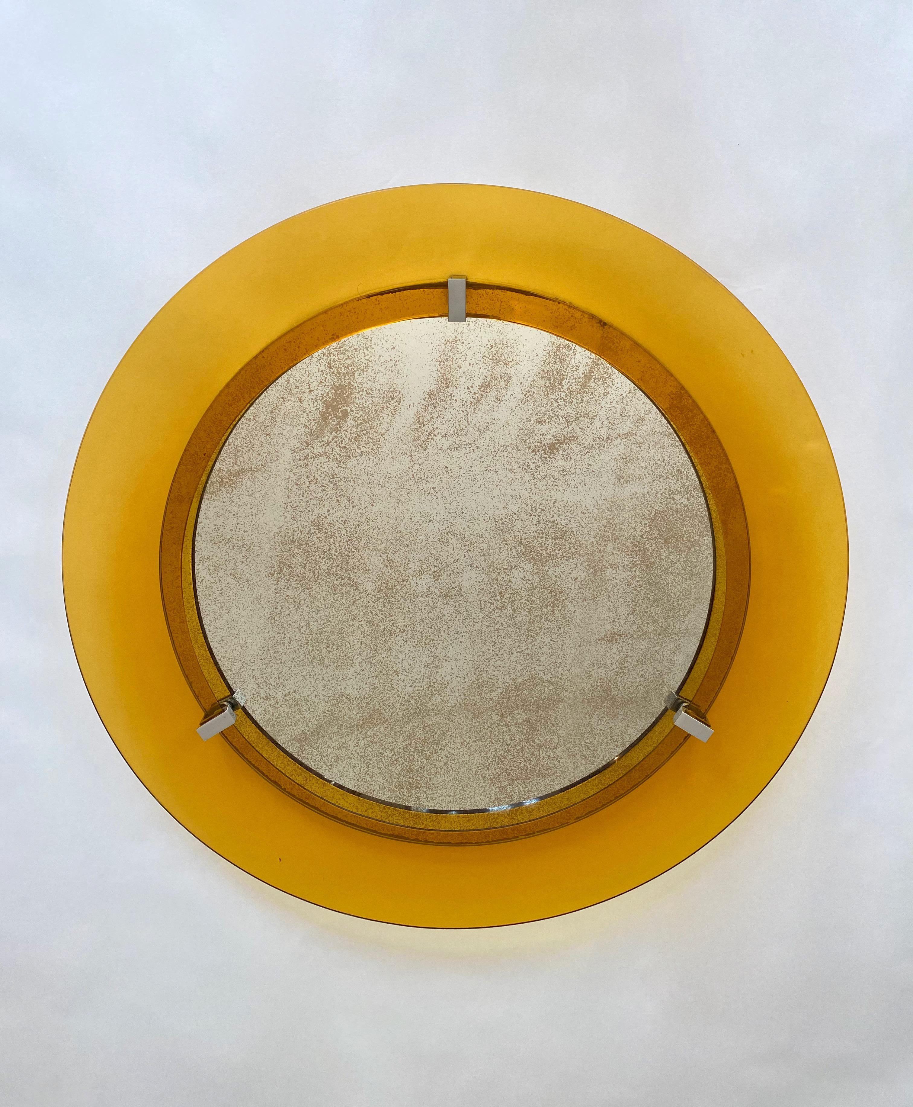 Round wall mirror in a yellow convex glass frame by the Italian design house Veca (original label still attached), 1960s.