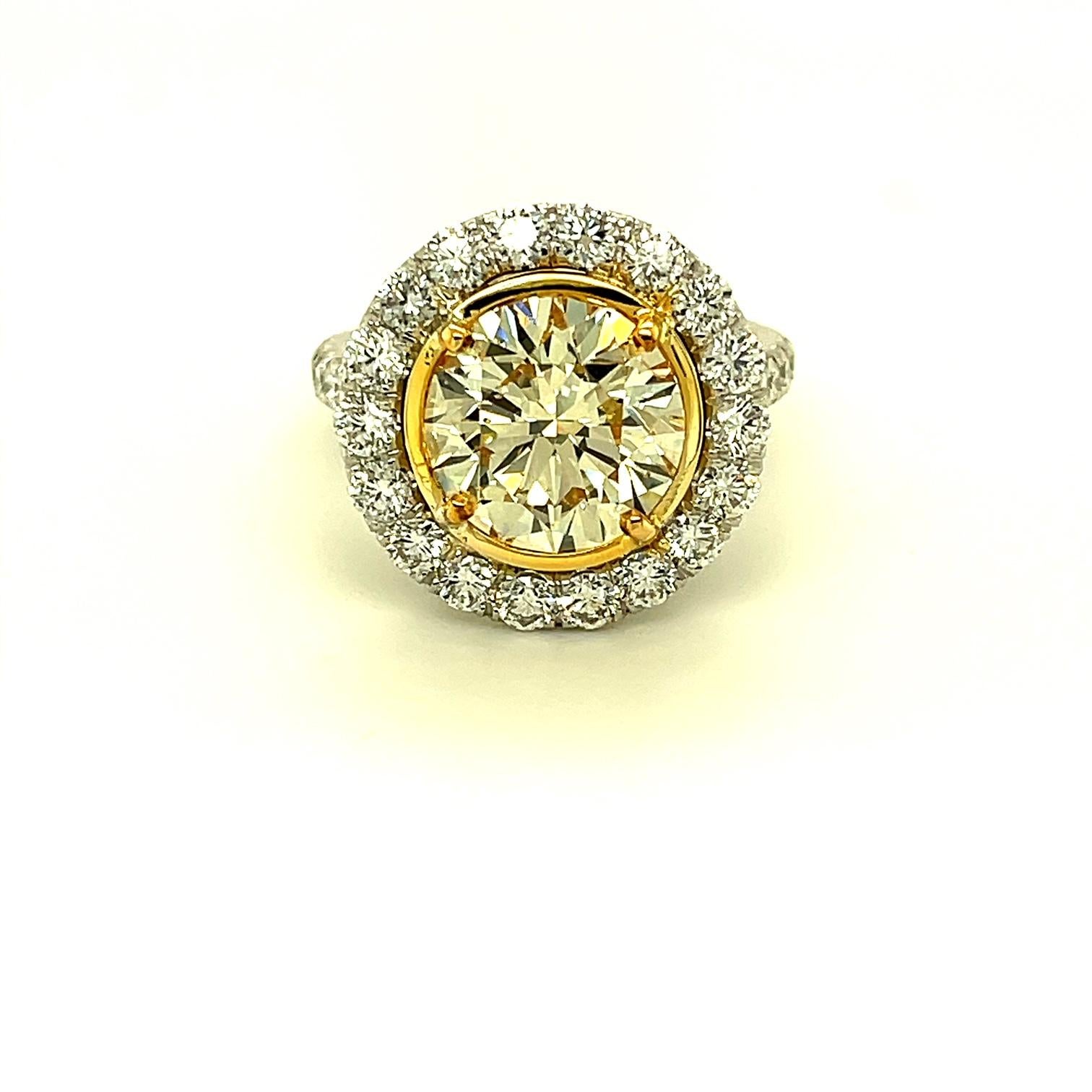 
Yellow Round Diamond Ring 4.01 carats set with 2.17 carats Micro pave.

Spectacular. Set in Platinum/18KYG

Stunning! Looks like nice FANCY LIGHT YELLOW.

Round Diamond weighs 4.01 carats. 

S-T Color,  SI2 Clarity

With GIA Certificate #