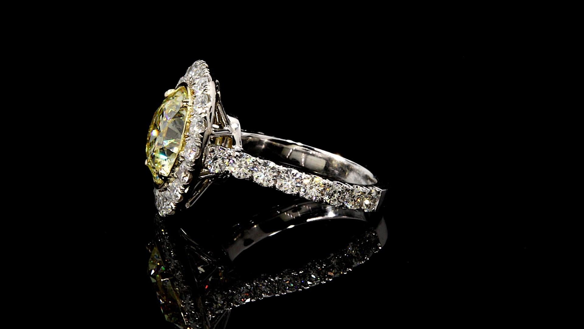 
Yellow Round Diamond Ring 5.32 carats set with 2.70 carats Micro pave.

Spectacular. Set in Platinum/18KYG

Stunning! Looks like nice FANCY LIGHT YELLOW.

Round Diamond weighs 5.32 carats. 

Small Round Diamond 2.70 carats E/F Color VS