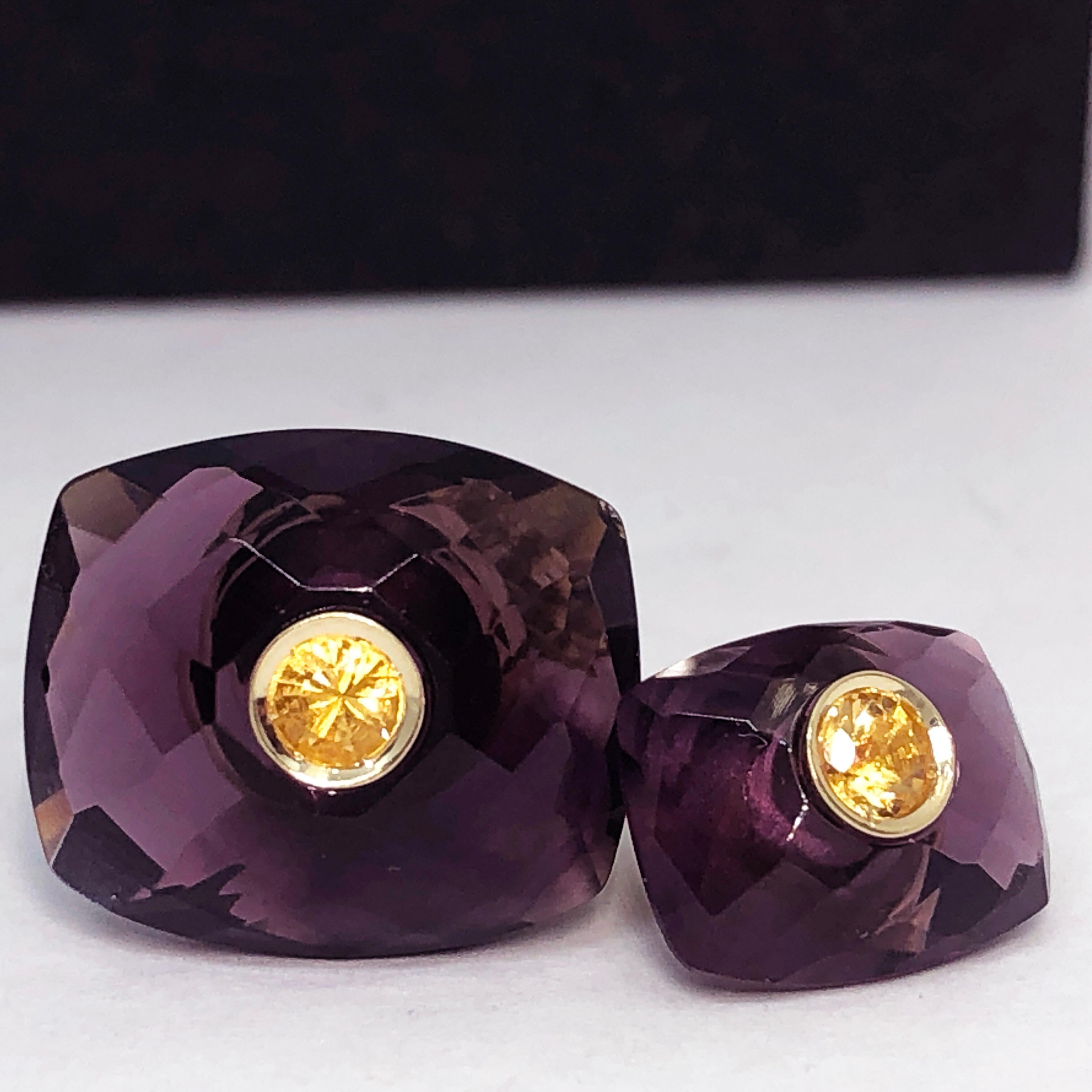 Unique yet Timeless 0.42 Carat Round Yellow Sapphire in a 21.00 Carat Hand Inlaid Double Faceted  Amethyst Yellow Gold Cufflinks.
In our smart fitted black box.
