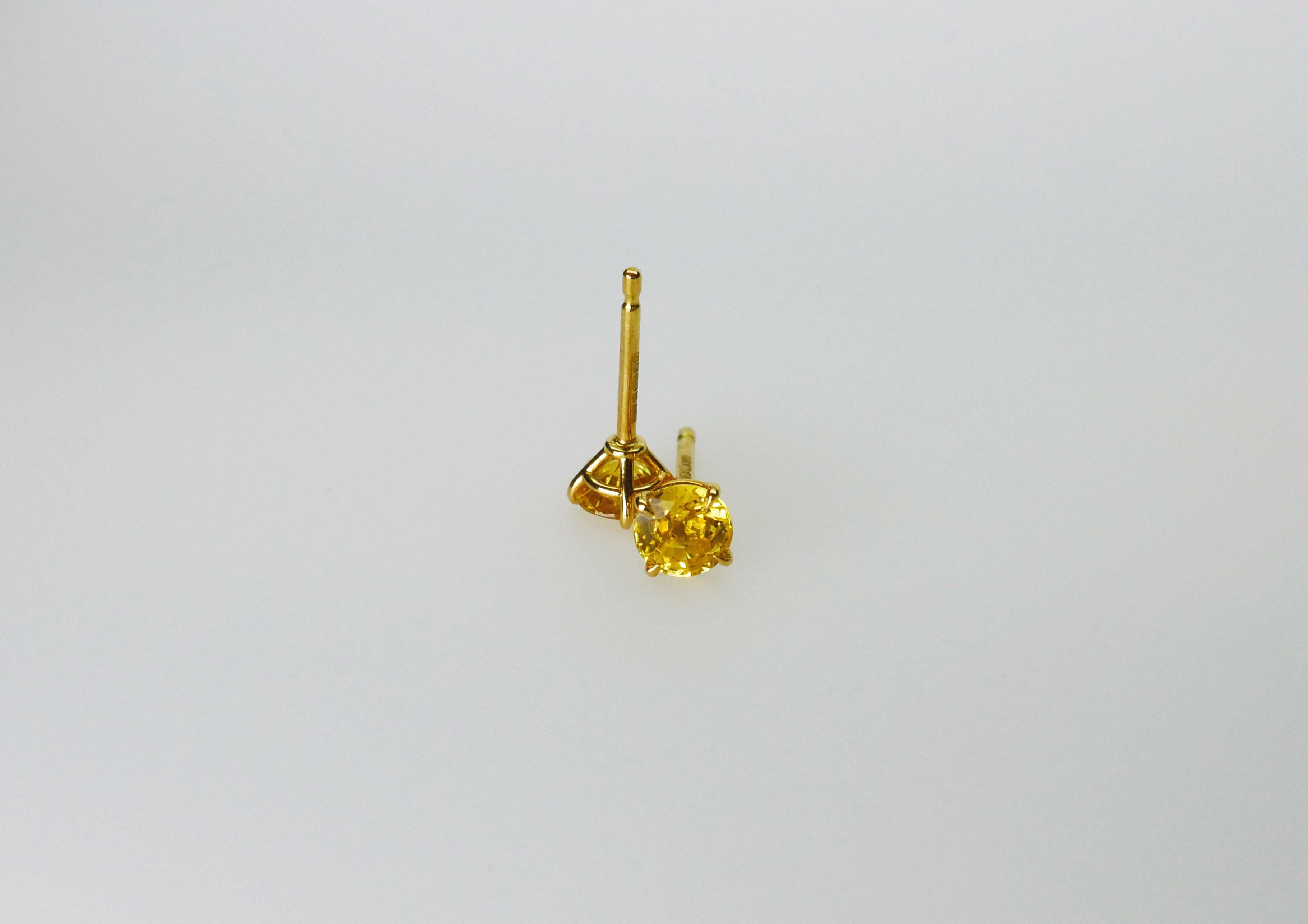 Contemporary Round Yellow Sapphire Studs in 18 Karat Yellow Gold For Sale