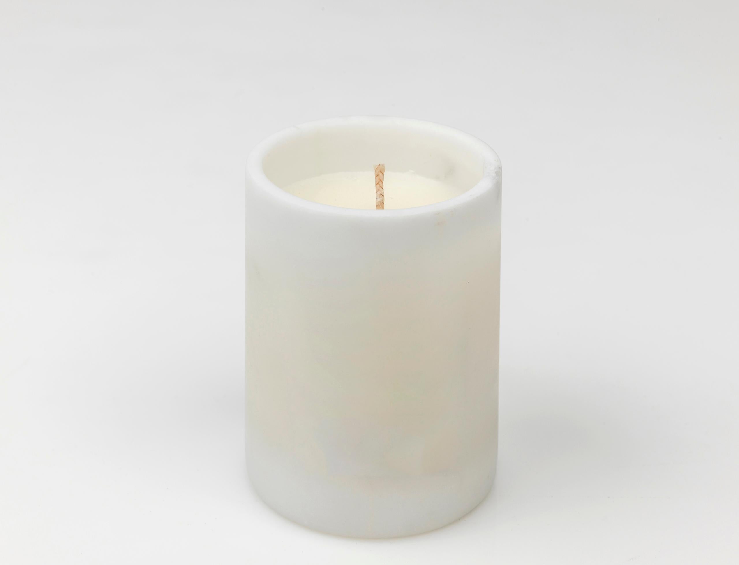 Rounded candle with external candle holder in white Carrara marble, contains scented wax, the fragrance is Lime and bamboo mix. The candle comes with a gift box as shown in the picture.
Zona67 is the name of the marble quarry that belongs to the