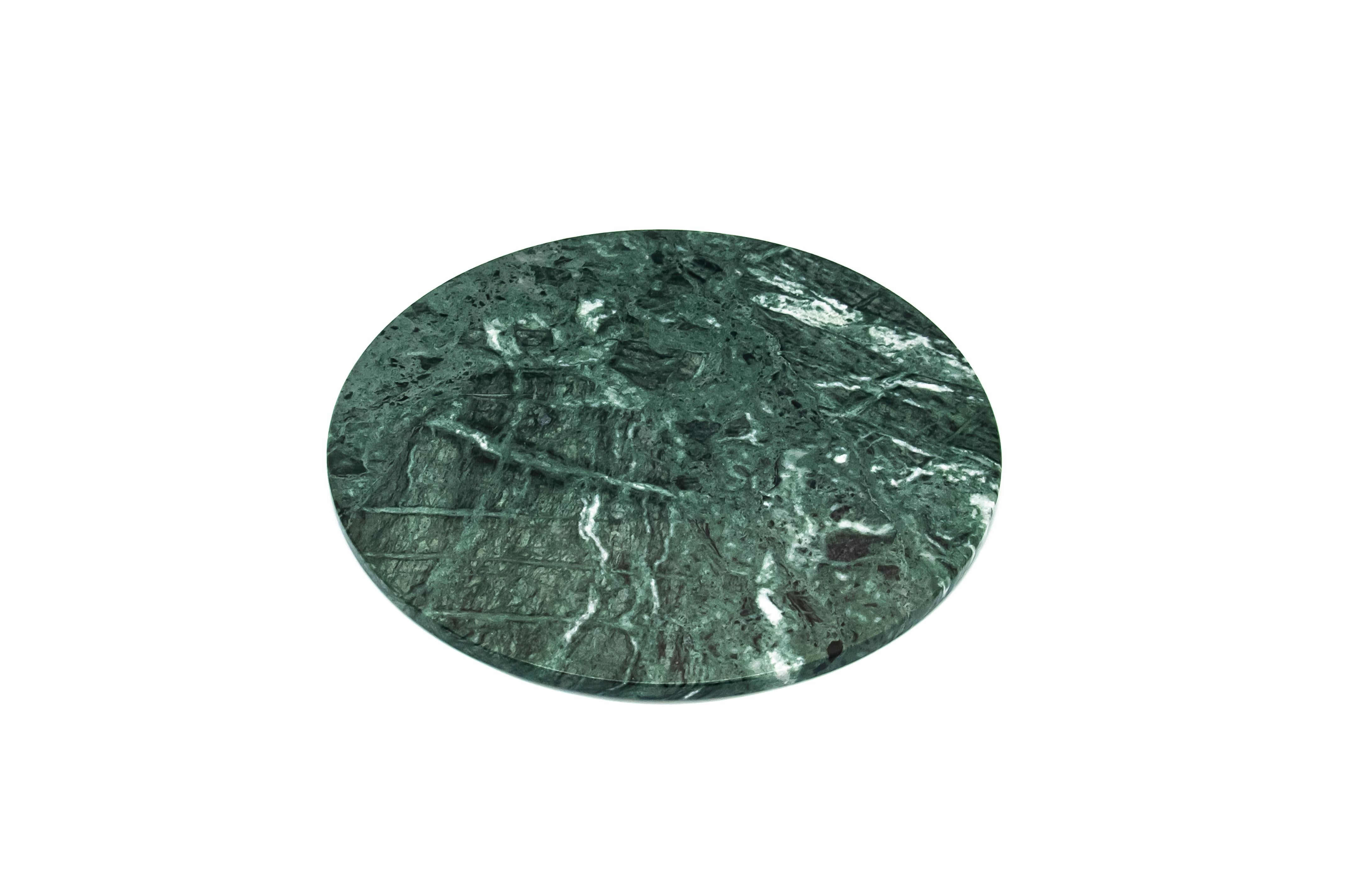 Rounded green Guatemala marble cheese plate. Each piece is in a way unique (every marble block is different in veins and shades) and handmade by Italian artisans specialized over generations in processing marble. Slight variations in shape, color