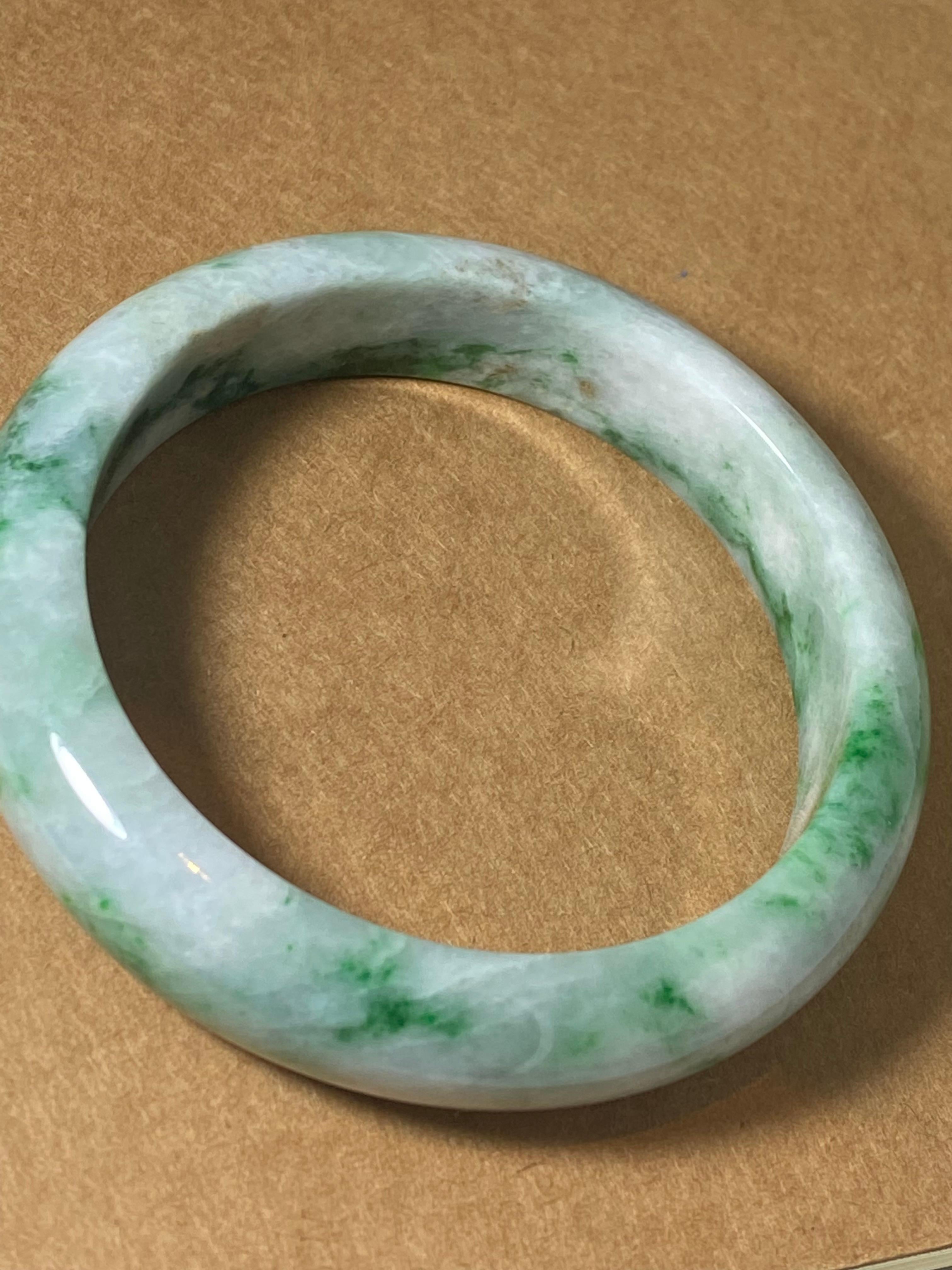 Women's Rounded Green & White Jade Bangle, 65.3gr. 15mm wide, 21cm circumference. For Sale