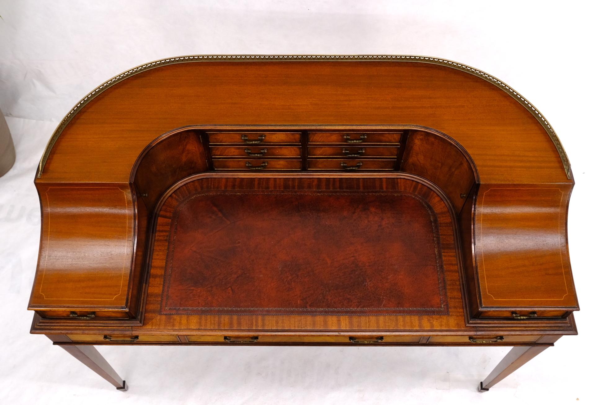 Rounded federal style brass gallery mahogany gallery.