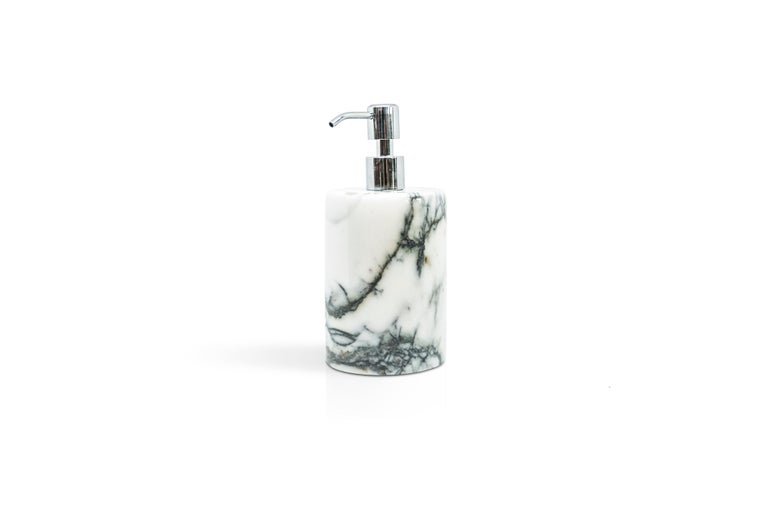 A rounded set for the bathroom in Paonazzo marble which includes: One soap dispenser (diameter 9 x 19.5 cm), one toothbrush holder (diameter 7 x 12 cm), one soap dish (diameter 10 x 2 cm).
Each piece is in a way unique (since each marble block is