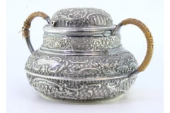 Rounded silver sugar bowl w/ reliefs around monogram plaque & coated handles