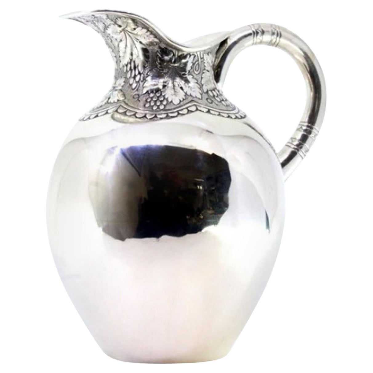 Rounded silver water jug