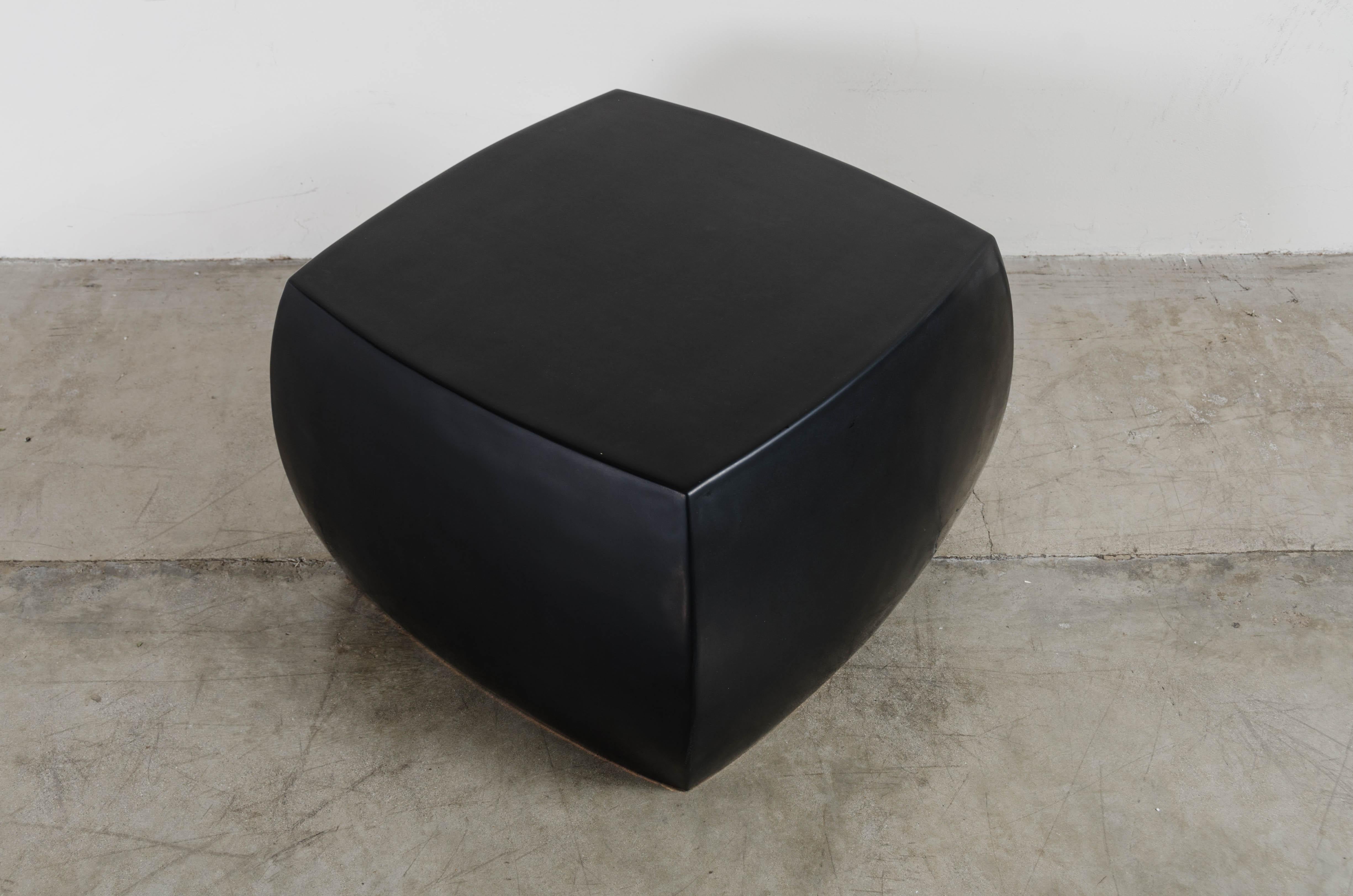Rounded square stool
Black lacquer
Hand repousse
Limited edition
Each piece is handcrafted individually and is unique.

Lacquer is a technique that dates back to the Shang dynasty, circa 1600-1100 B.C. The pieces are made with at least 60