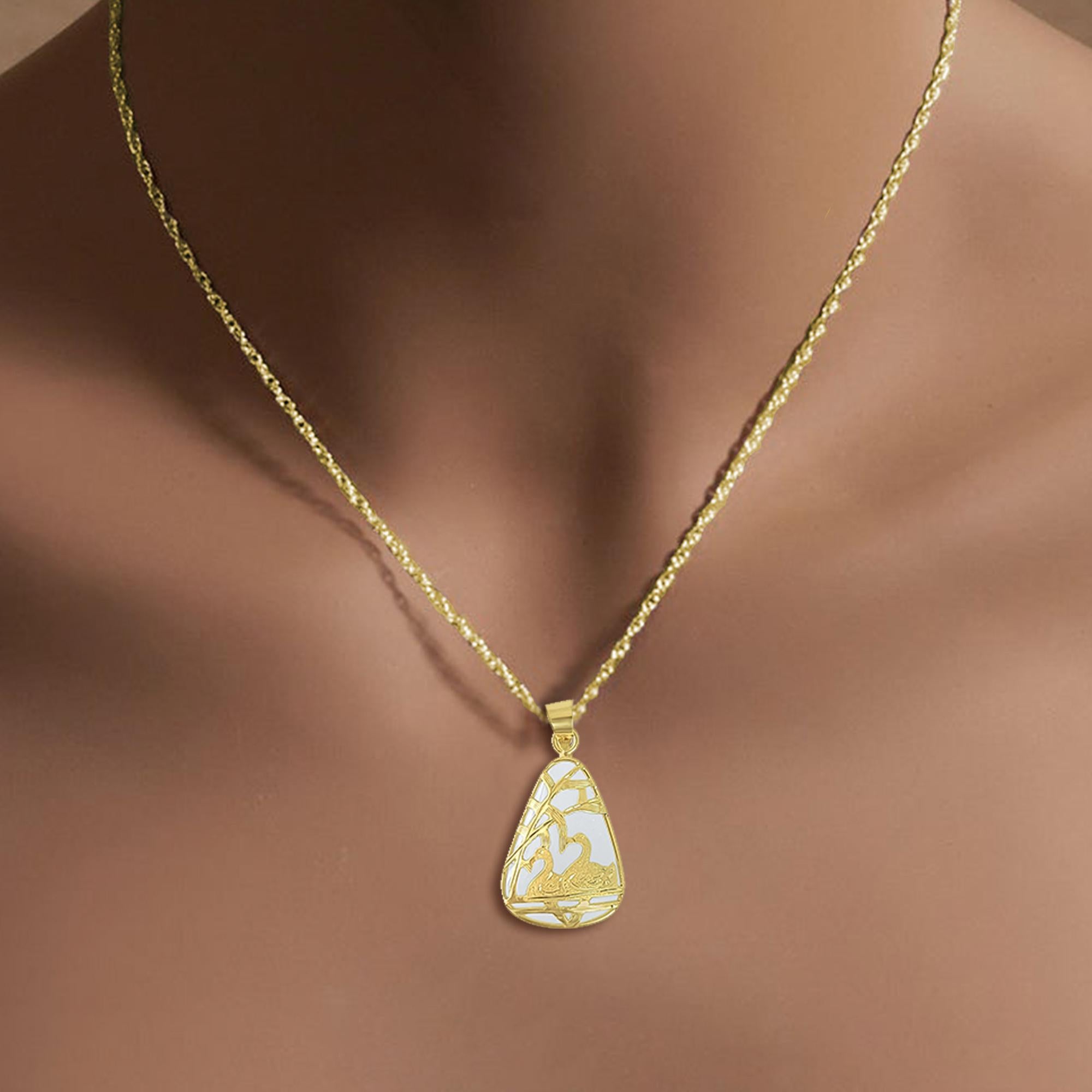 ♥ Product Summary ♥

Main Stone: Natural Genuine Jadeite with Swan Design in gold
Metal Purity: 14K Yellow Gold  
Weight: 2 grams
Dimensions: 25mm x 13mm with bail
Stone Cut: Rounded Triangle