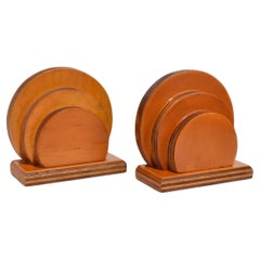 Fermalibri in legno arrotondati