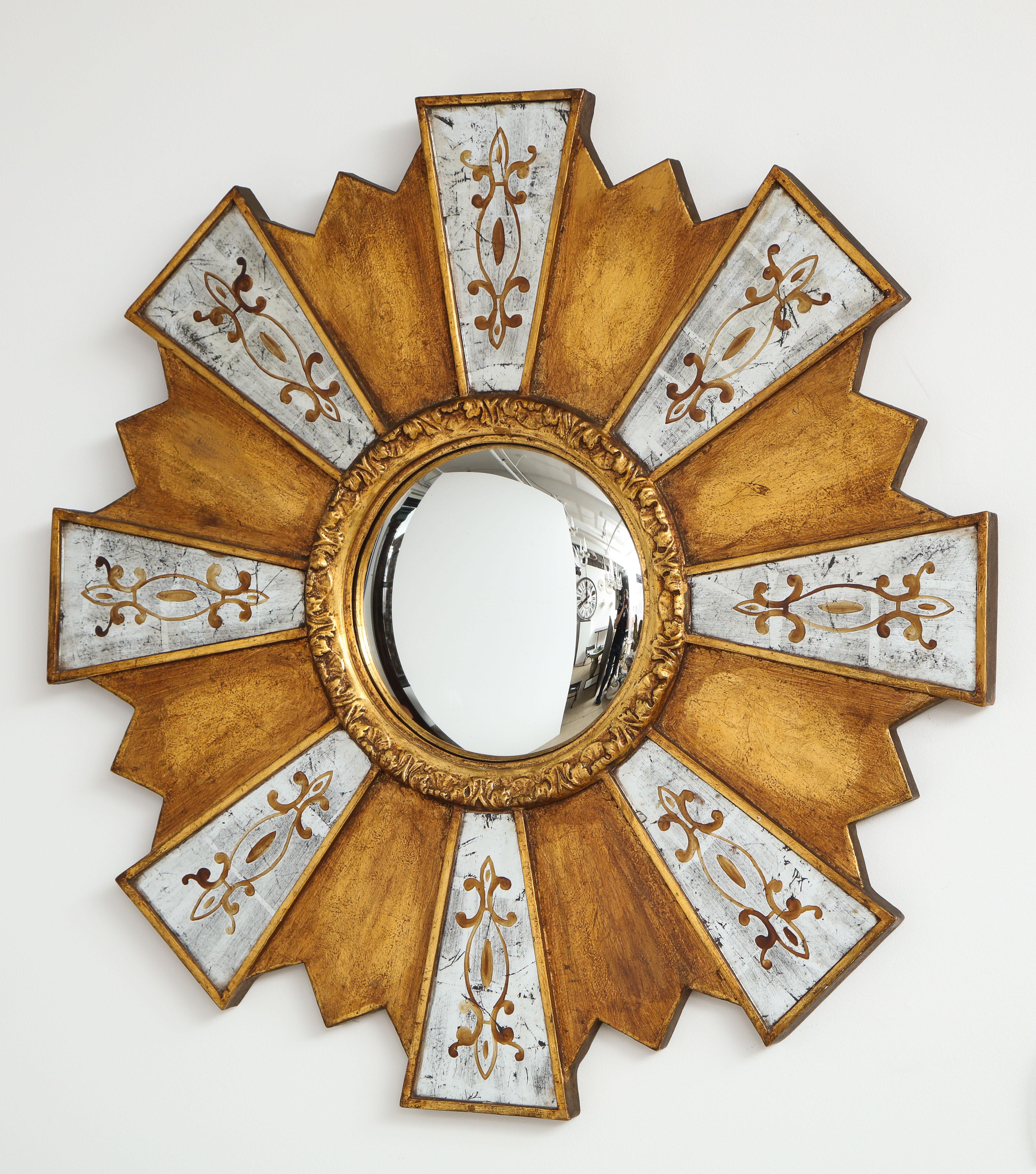 Roundel mirror having central convex beaded gilt mirror flanked by eglomise rays