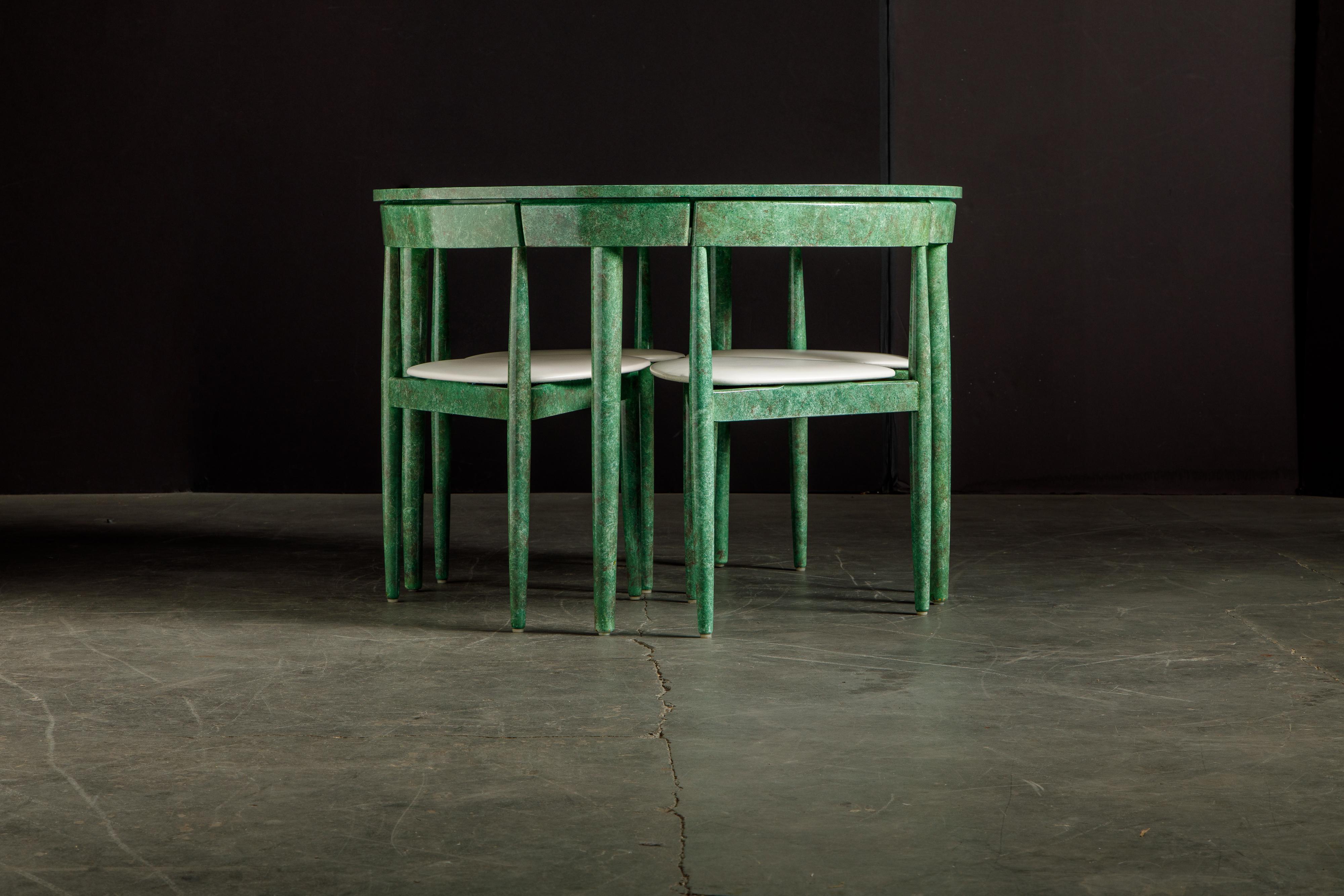 This unique and intriguing 'Roundette' dining table by Hans Olsen for Frem Røjle Møbelfabrik was finished by a local Arizona artist in a green marbleized finish which we newly lacquered is simply gorgeous. The set is signed underneath the dining