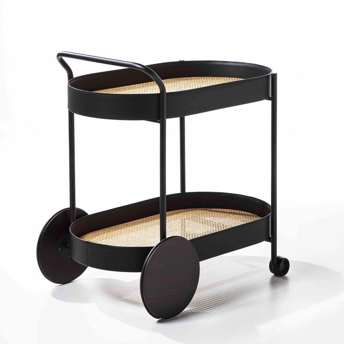 A stylish must-have for entertaining events, this cart is equipped with front and back wheels for easy transportation but works equally well as a static statement topped with a decanter set or flowers in any interior. Finished in matte black, the