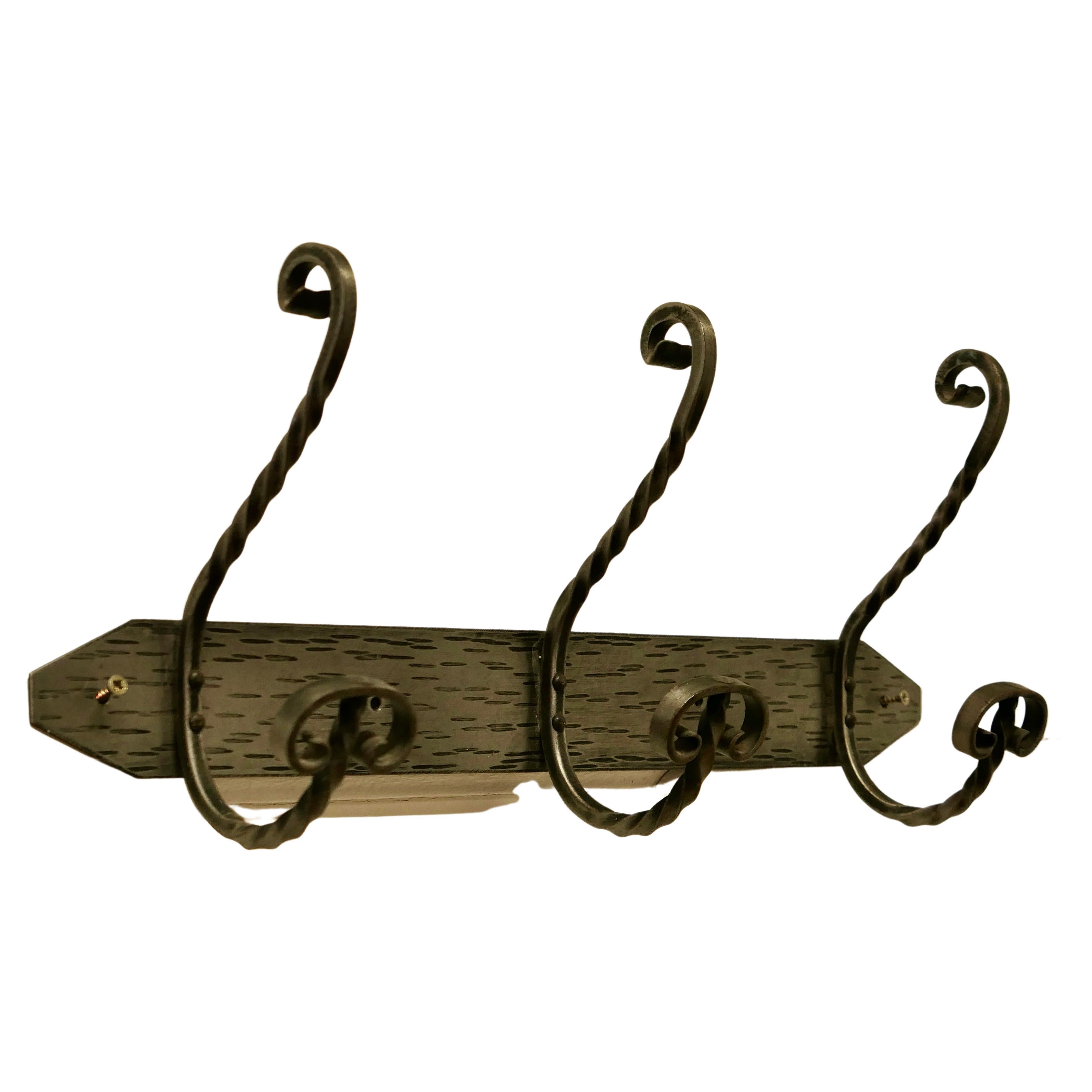 Row of 3 Polished Steel and  Wrought Iron Hat and Coat Hooks