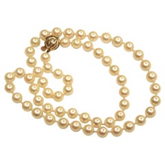 Row of Akoya Cultered Pearls Made by Mikimoto with 18 Carat Gold Snap circa 1980