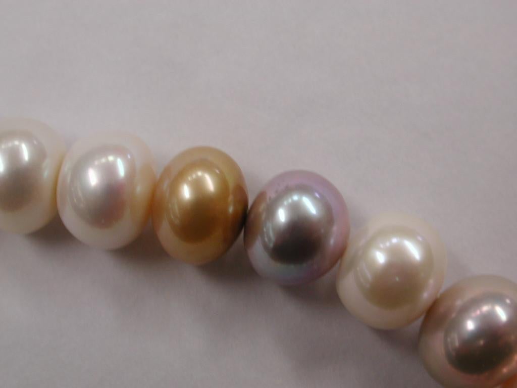 Contemporary Row of Multicolored Bouton Shaped Cultured Pearls with 9 Carat Gold Ball Snap