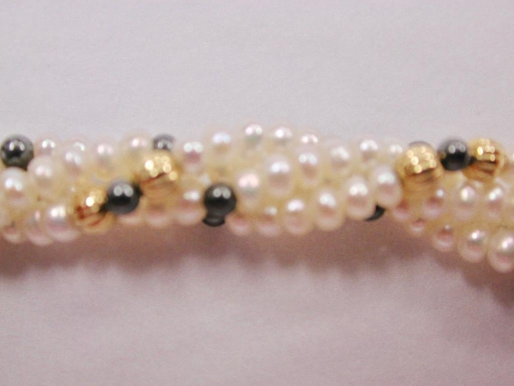 Modern Row of Twisted White Multi-Bouton Shaped Cultered Pearls, 18ct Gold Snap