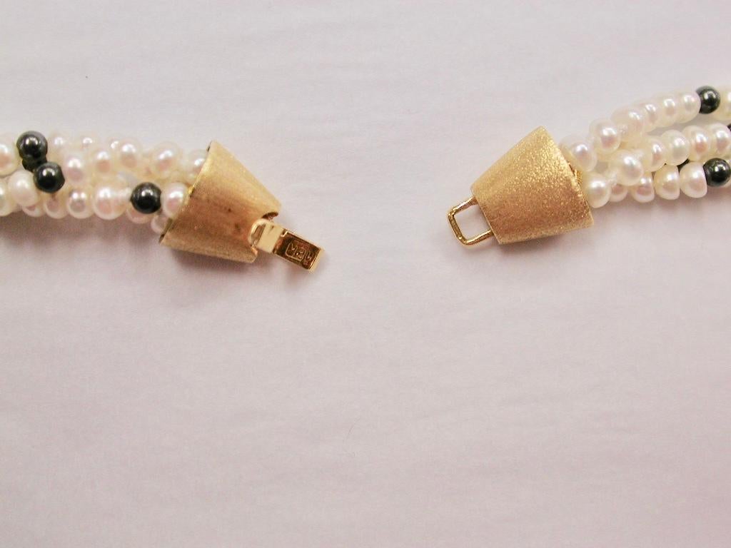 Row of Twisted White Multi-Bouton Shaped Cultered Pearls, 18ct Gold Snap In Excellent Condition In London, GB