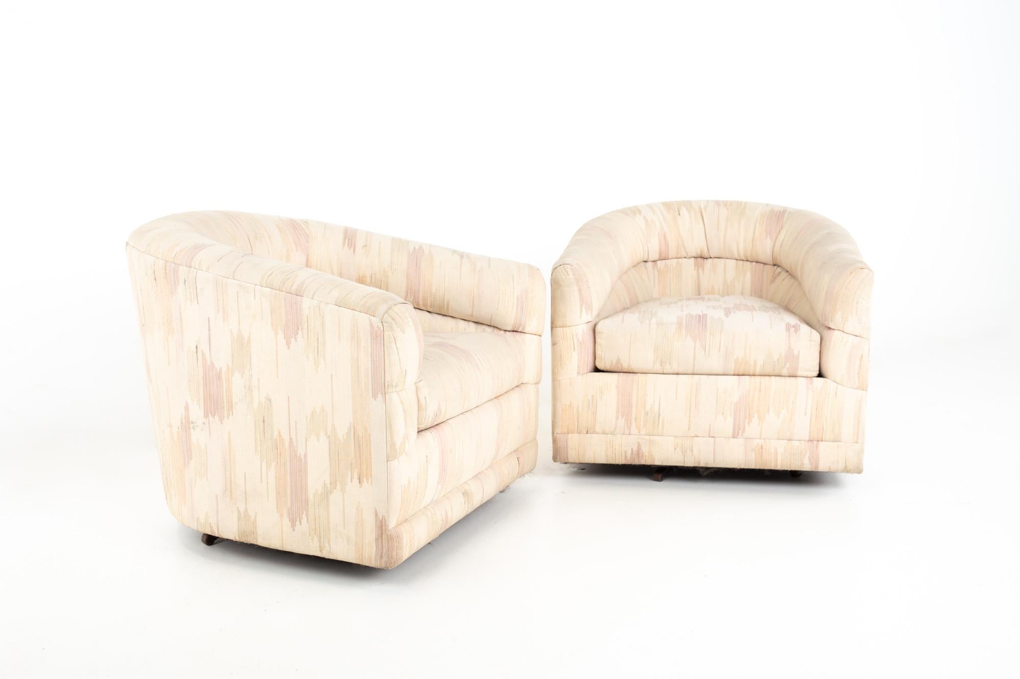 Rowe mid century barrel swivel lounge chairs, pair
Each chair measures: 31.25 wide x 32.25 deep x 28 inches high, with a seat height of 17 and arm height of 22 inches

All pieces of furniture can be had in what we call restored vintage condition.