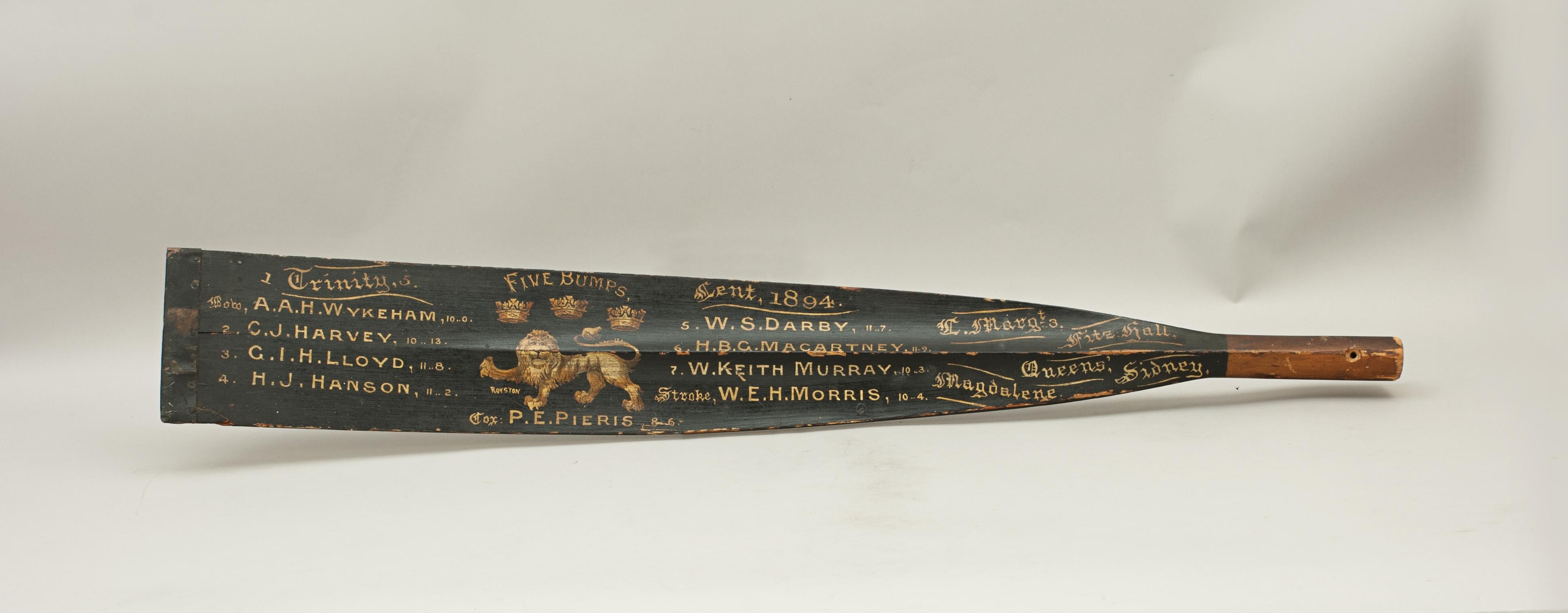 Cambridge Presentation Oar, Trophy Blade, 1894.
This oar blade tip is an original traditional Trinity College (Cambridge University) presentation rowing oar tip with calligraphy and The 1st Trinity Boat Club insignia. The paint and writing on the