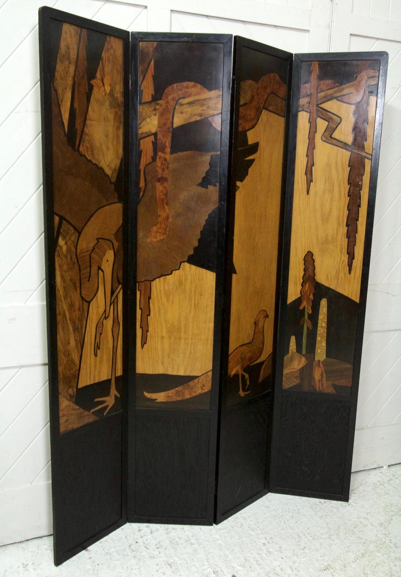 An Extremely rare four fold wood inlay screen
'THE JUNGLE'
Designed by W A Chase 
For THE ROWLEY GALLERY
Exhibited in 1924
Measures: height 190 cm full width 140cm (each panel 35cm wide)

This screen is a wonderful example of the